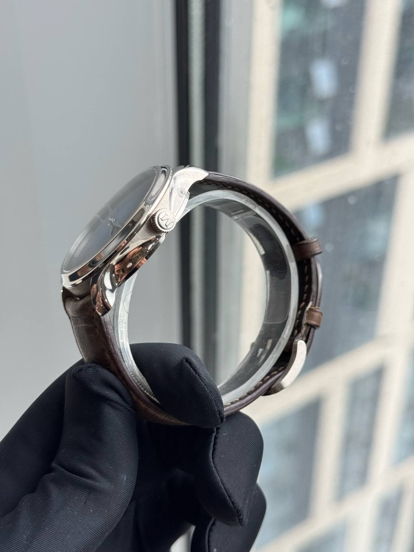 May be an image of wrist watch and ring