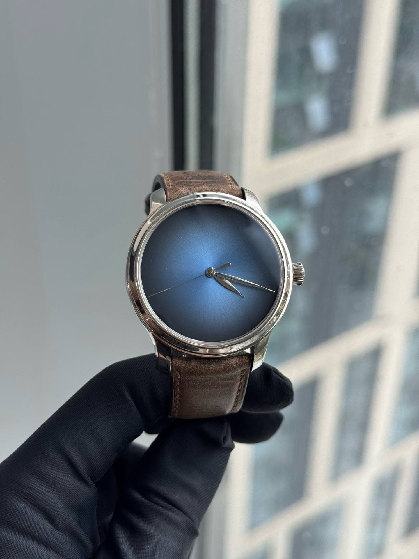 May be an image of wrist watch and text