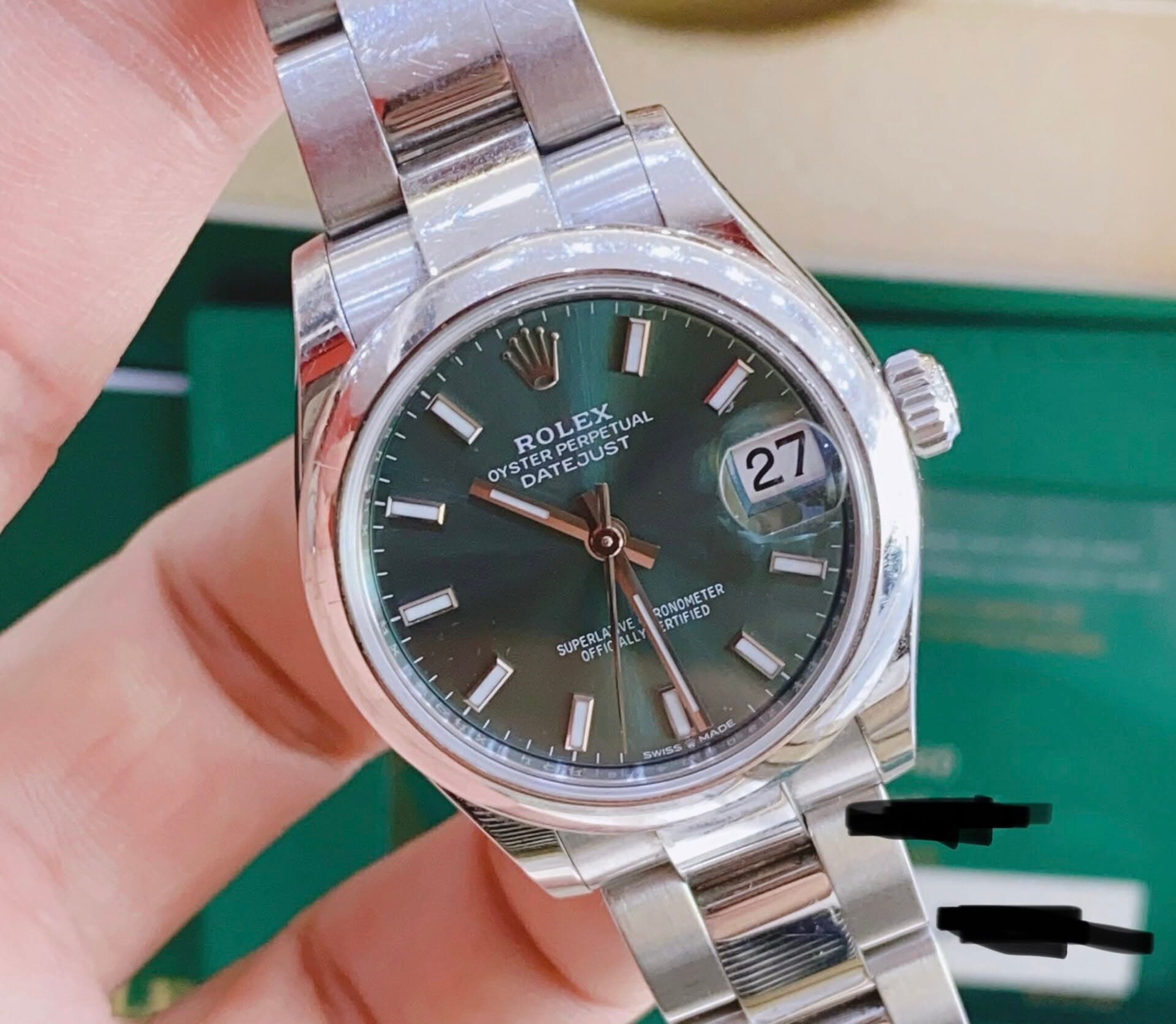 May be an image of wrist watch and text that says 'n ROLEX OYSTER DATEJUST TEJUST EJUST T RO PERPETUAL EX TUAL OYS OYSTED I L 2 1 በሰ RONOMETER RTIFIED : SUPERLA AE ALLY OFFK ပးခ…