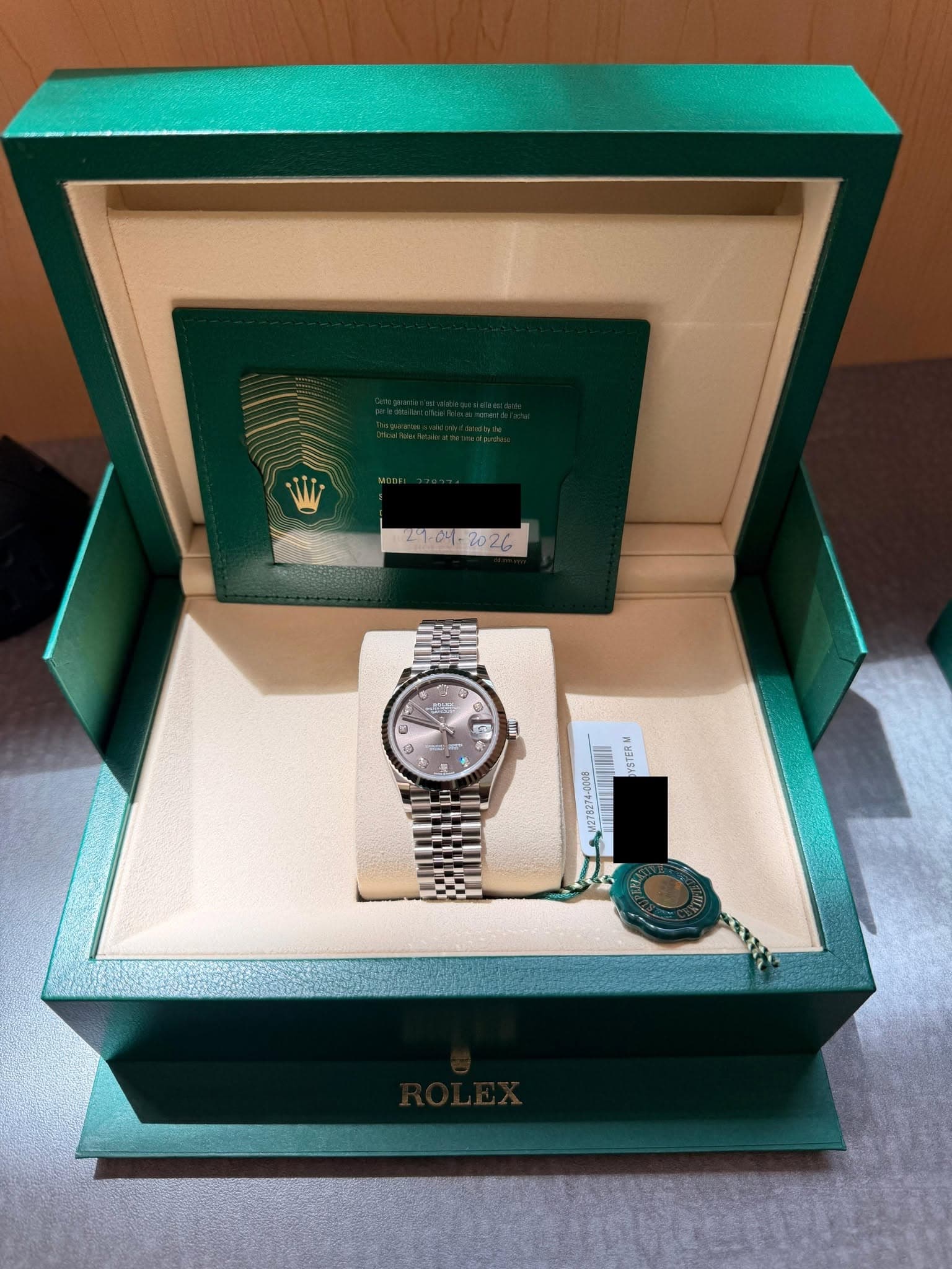 May be an image of wrist watch and text