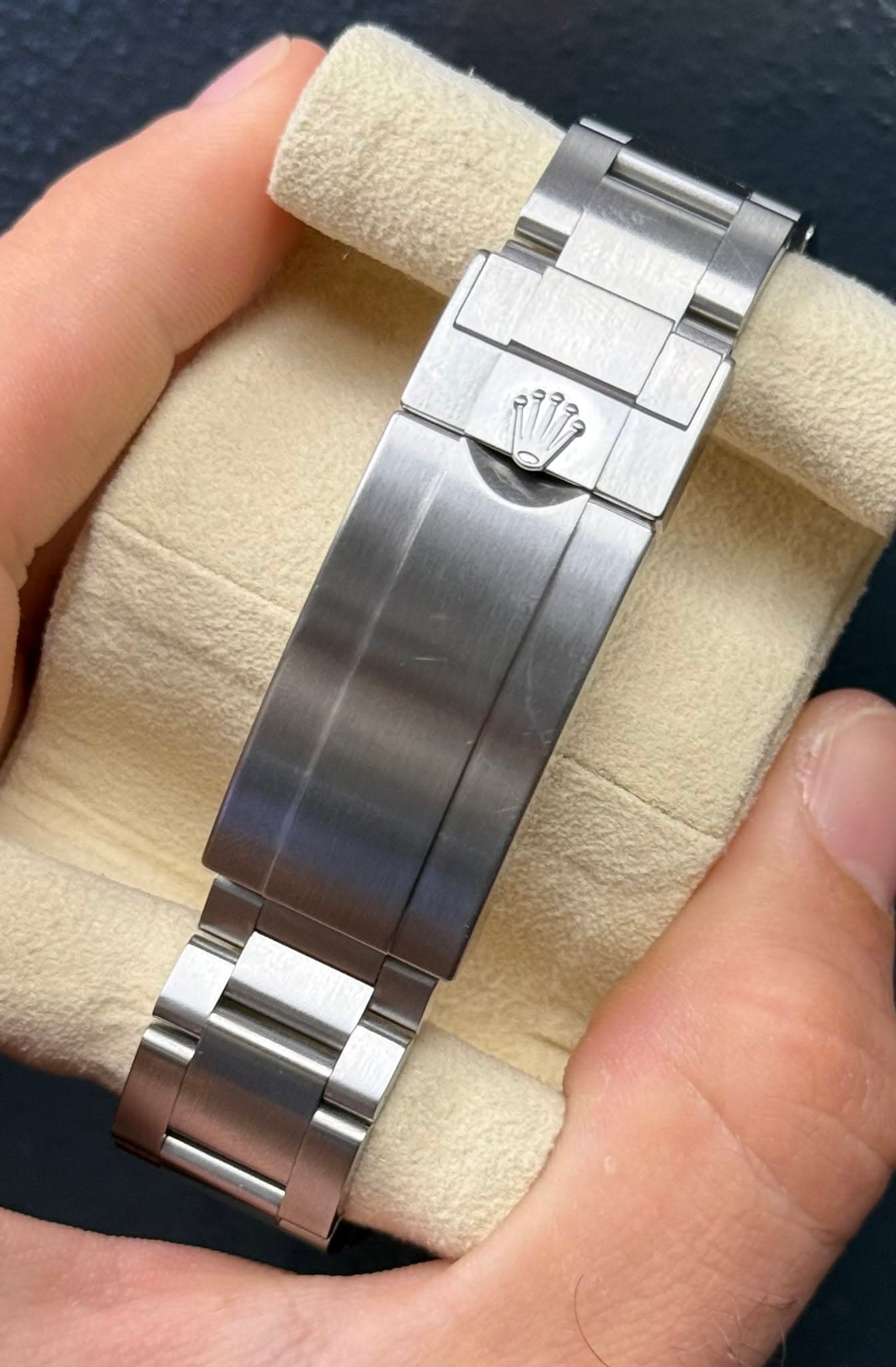 May be an image of wrist watch and text