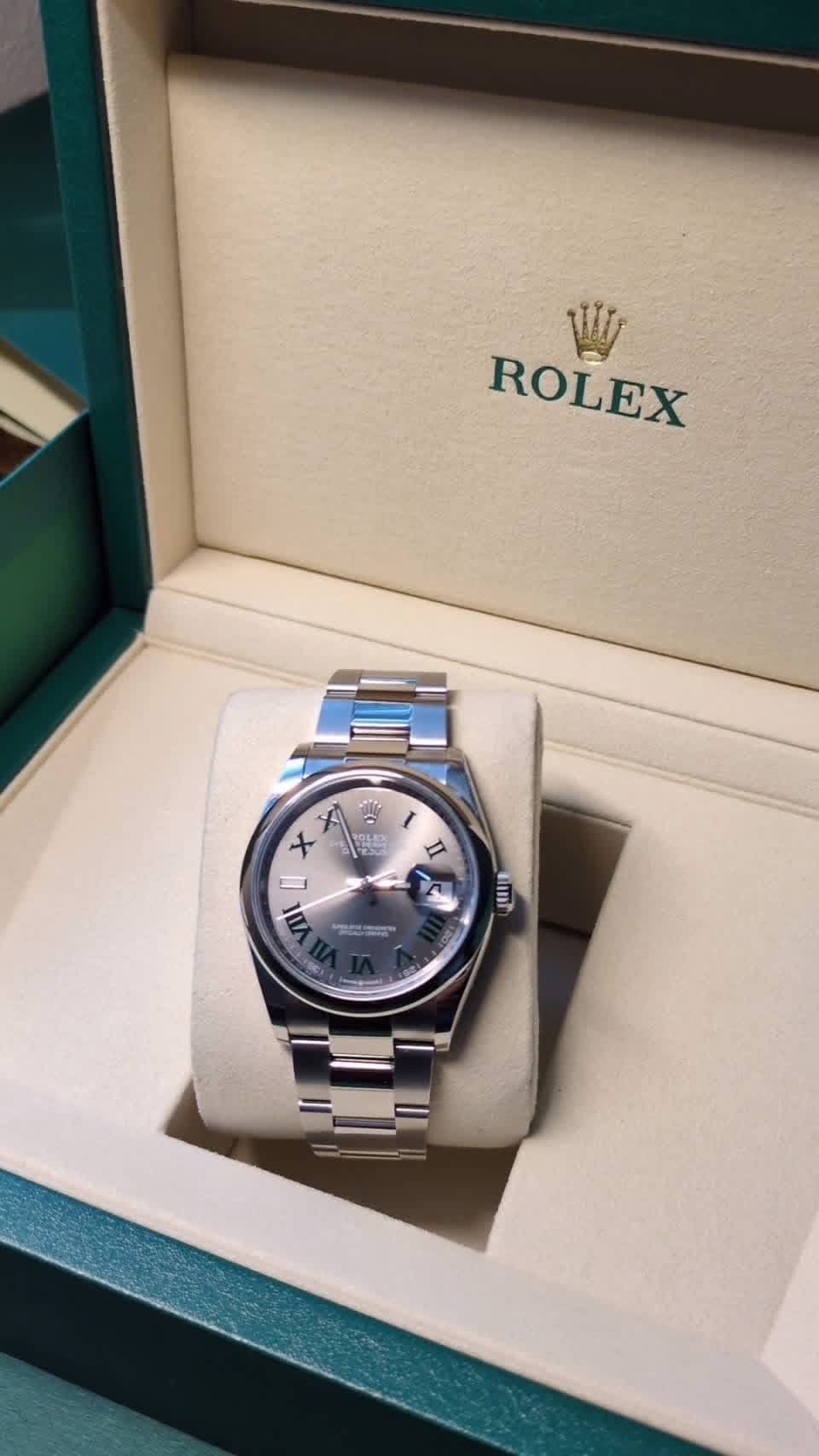 May be an image of wrist watch and text that says 'ROLEX ያ፡ AE W x X Il MI م um'