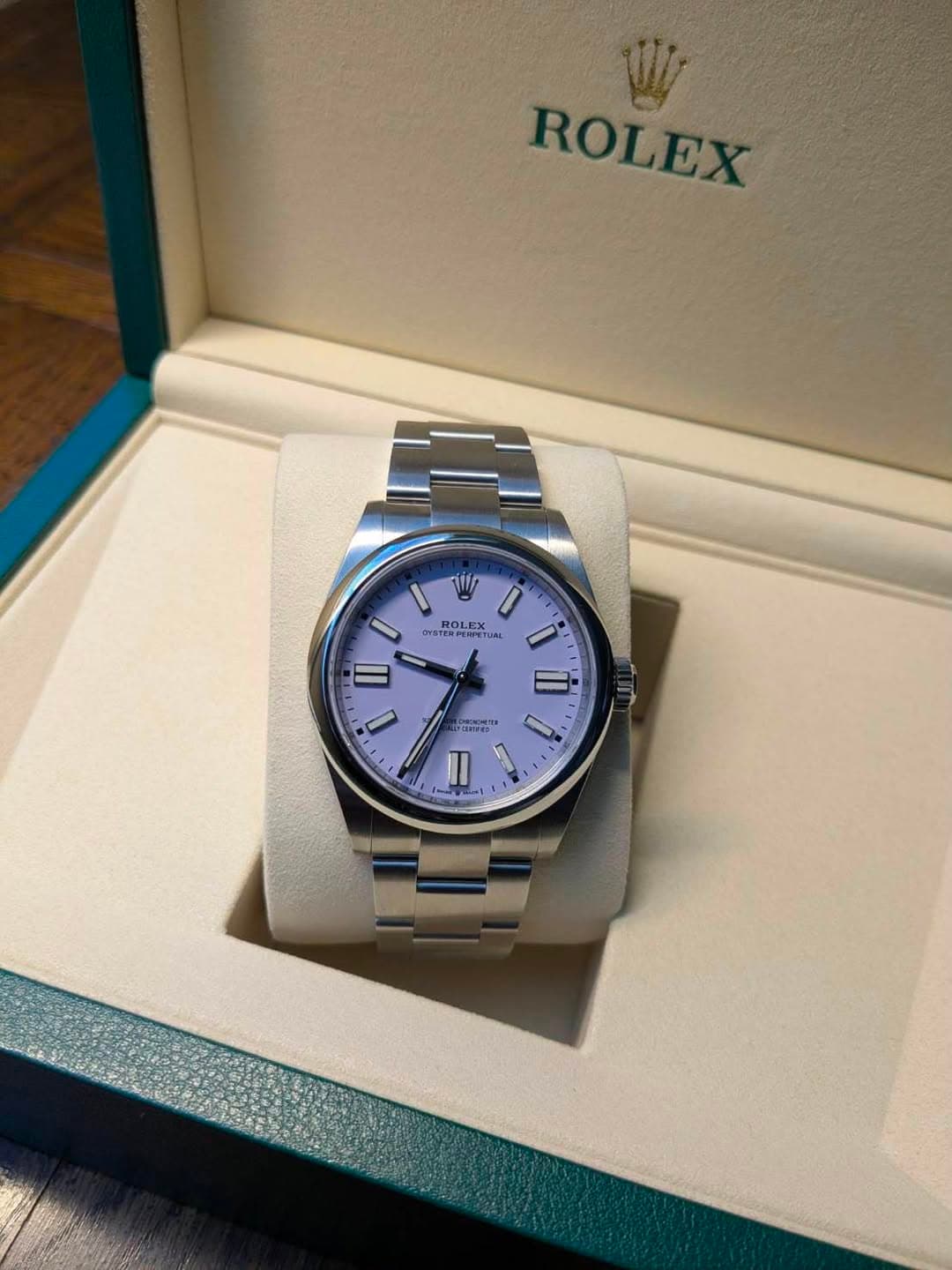 May be an image of wrist watch and text