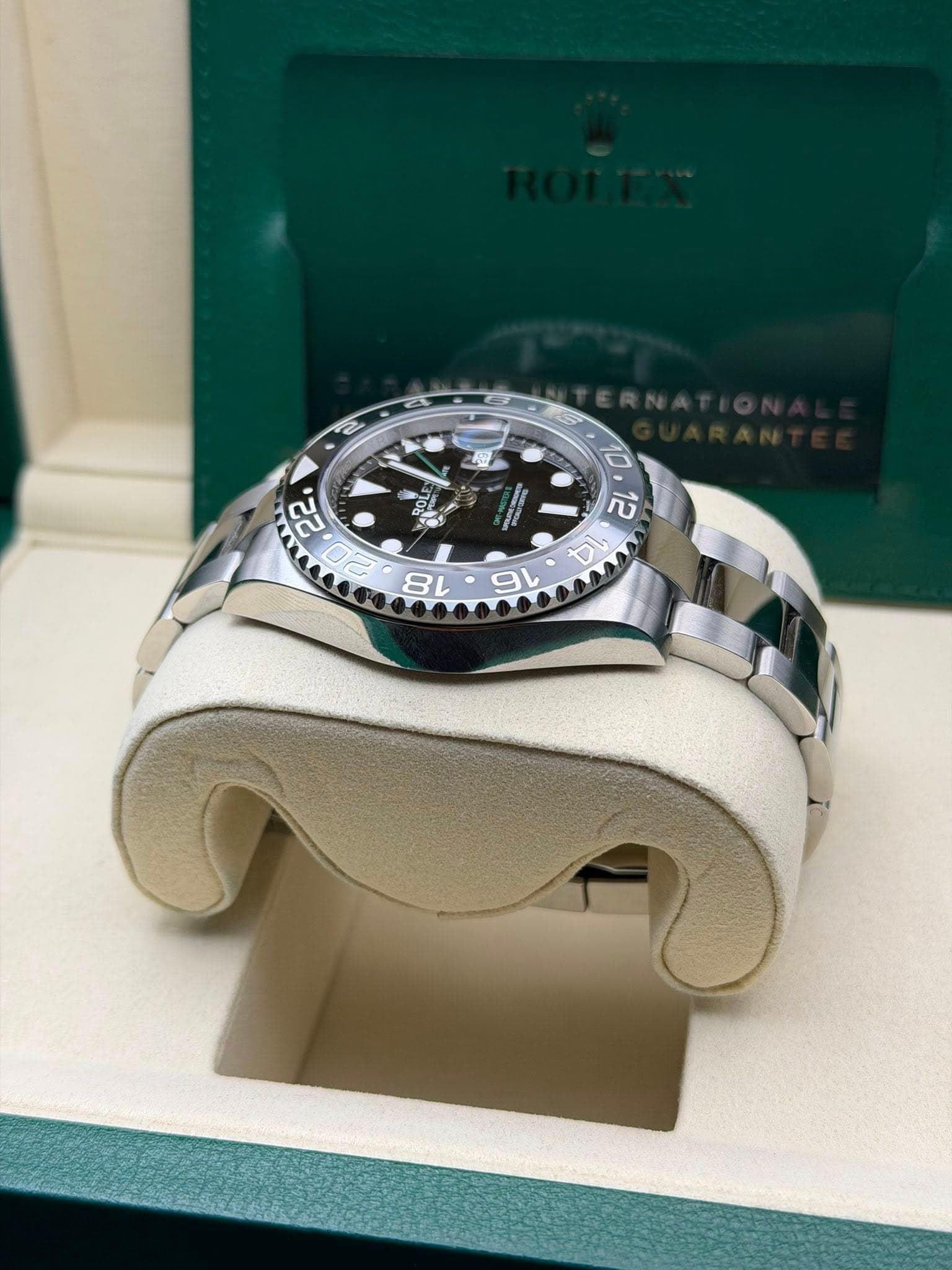 May be an image of wrist watch and text
