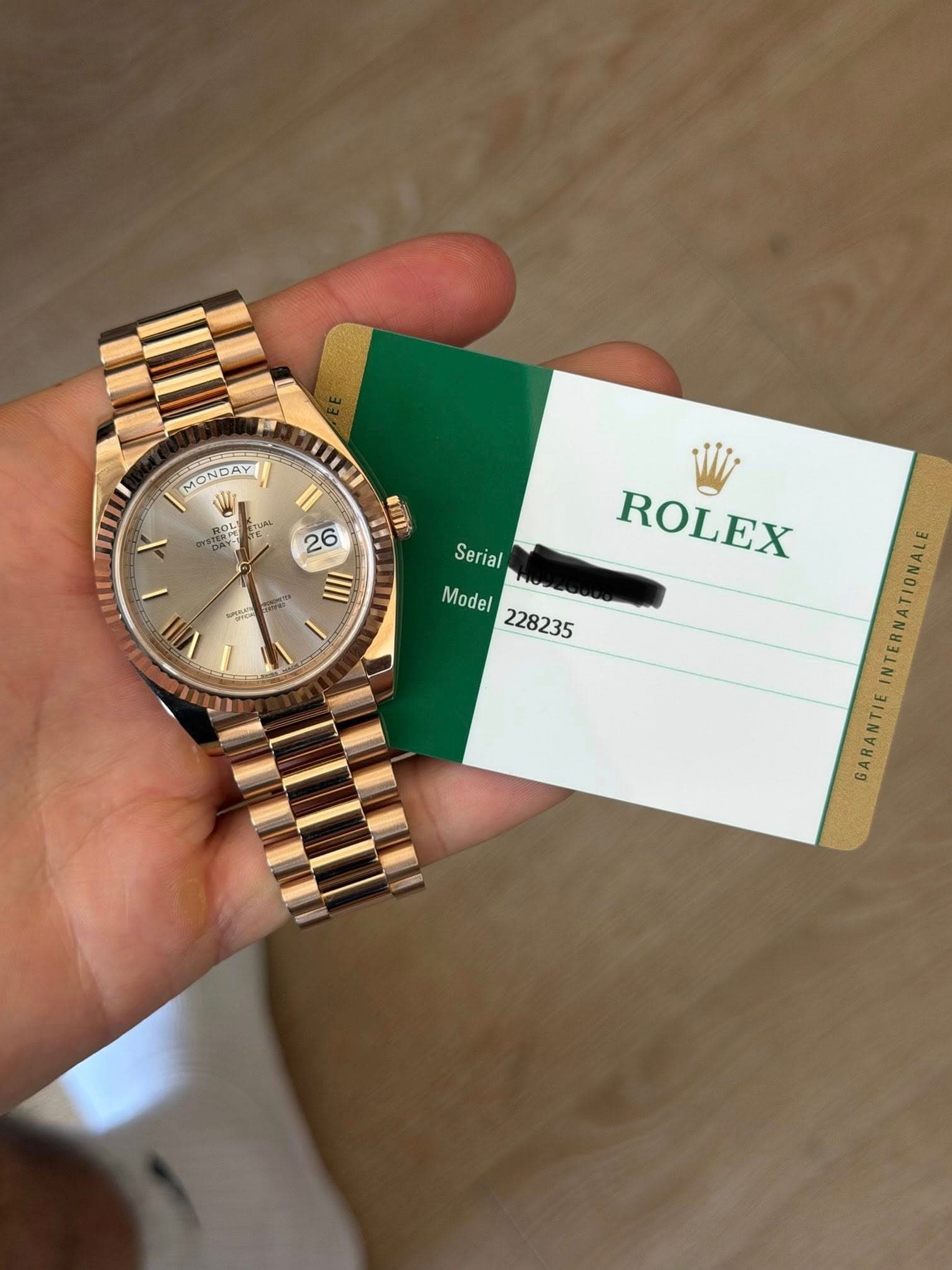 May be an image of wrist watch and text