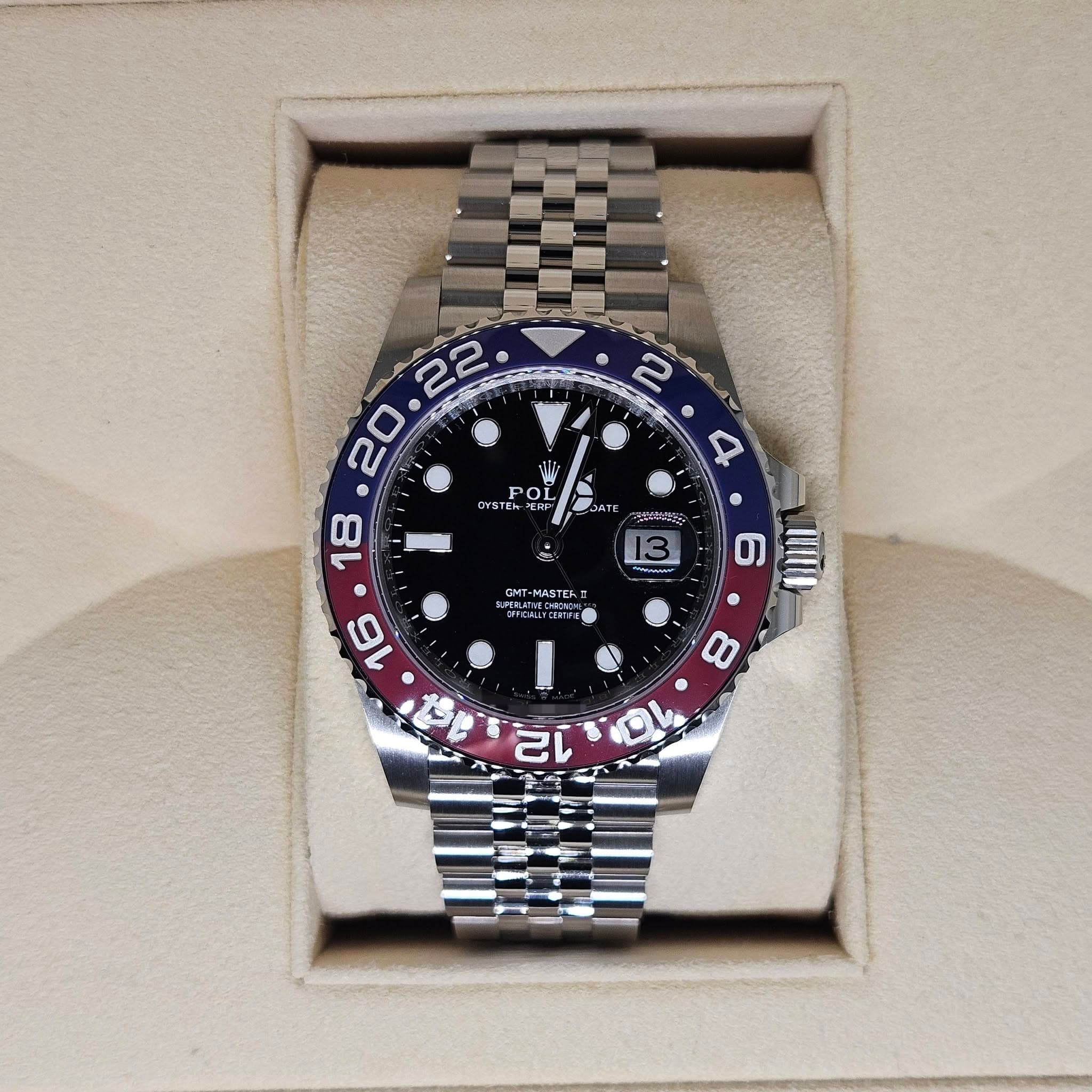 May be an image of wrist watch and text