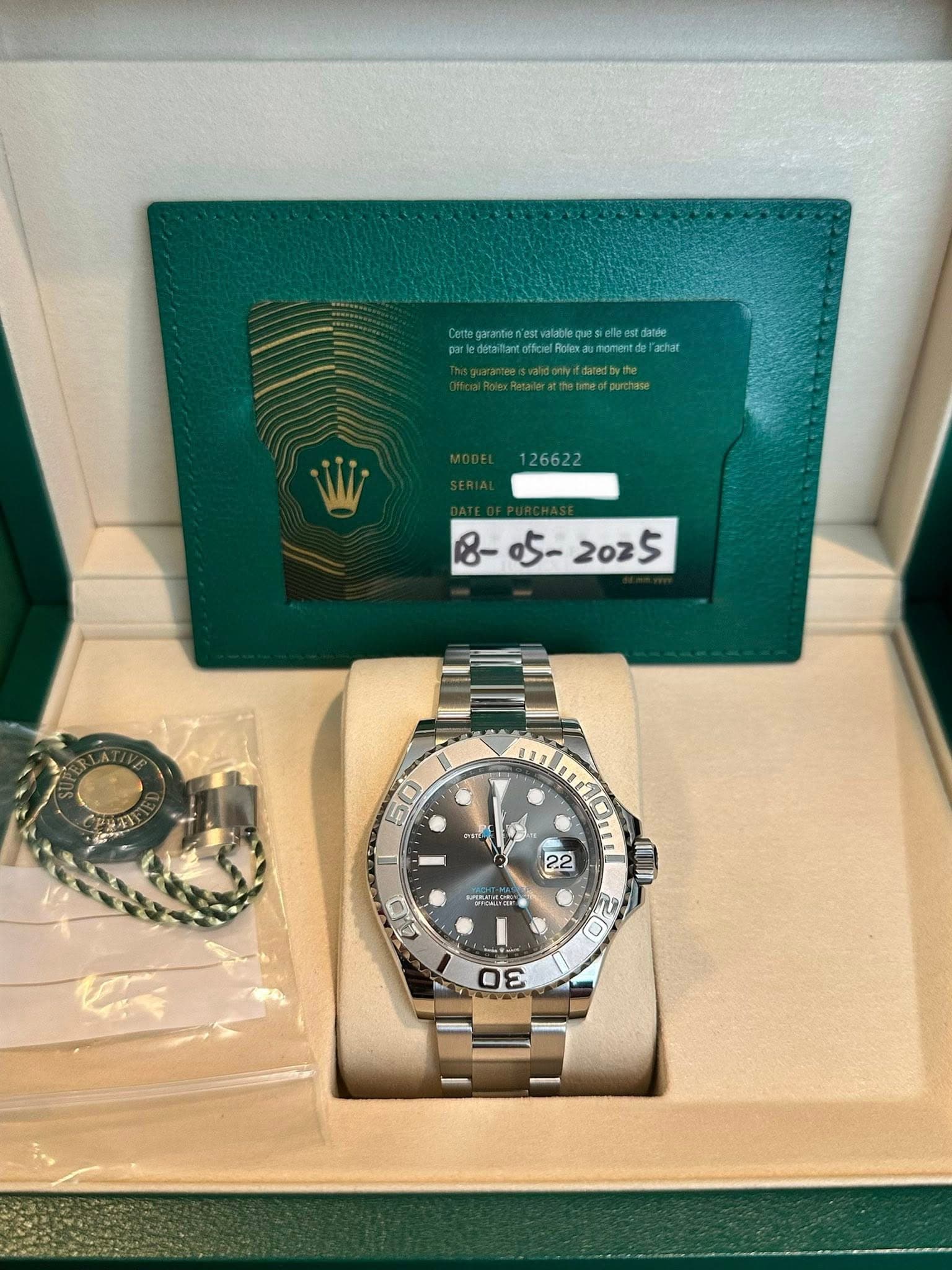 May be an image of wrist watch and text