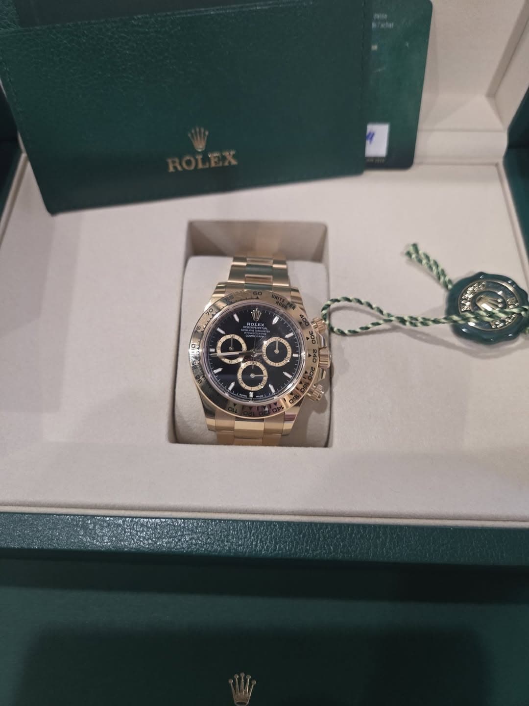 May be an image of wrist watch and text