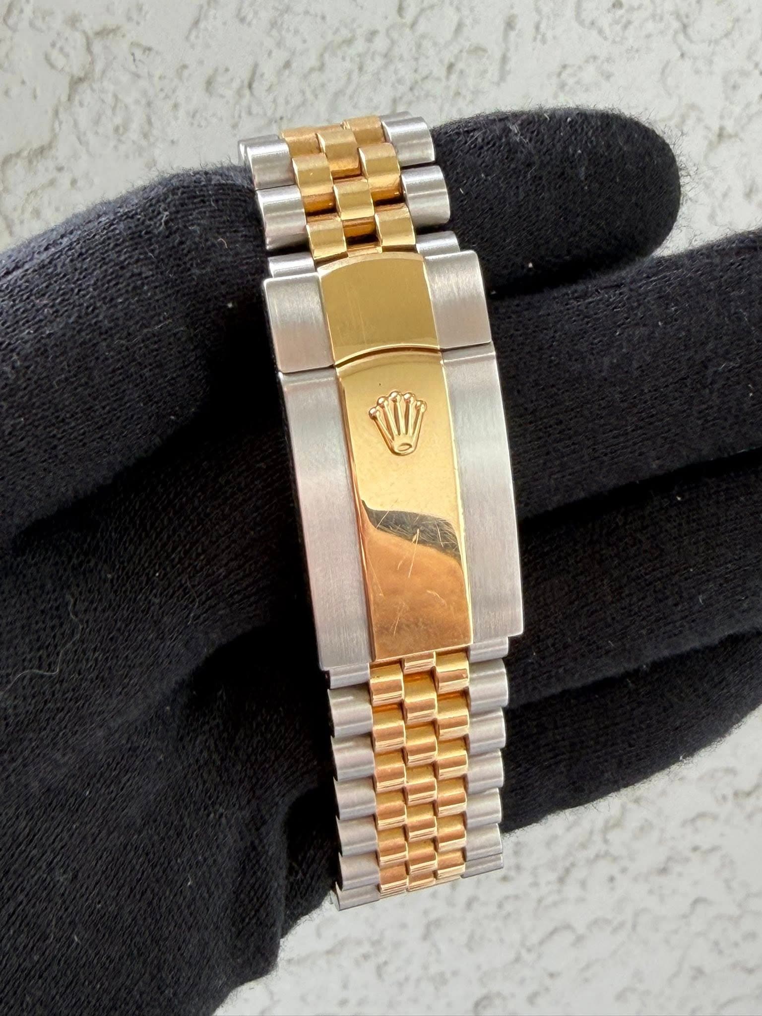 May be an image of wrist watch