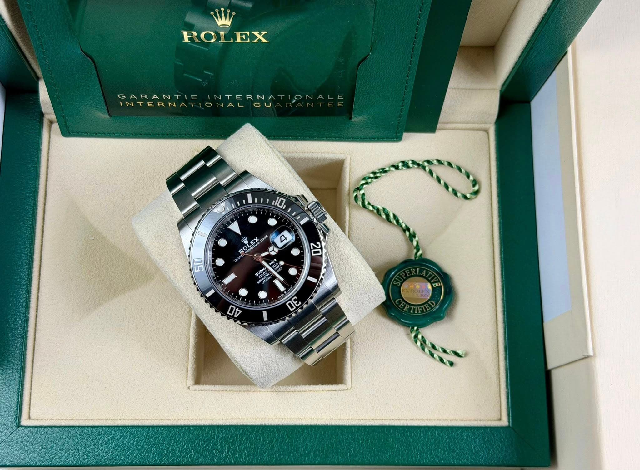 May be an image of wrist watch and text that says 'ROLEX ROI EX GARANT TERNA .10, 4 ROLEX LEX KO و 5L 20 1 4D ဖ'