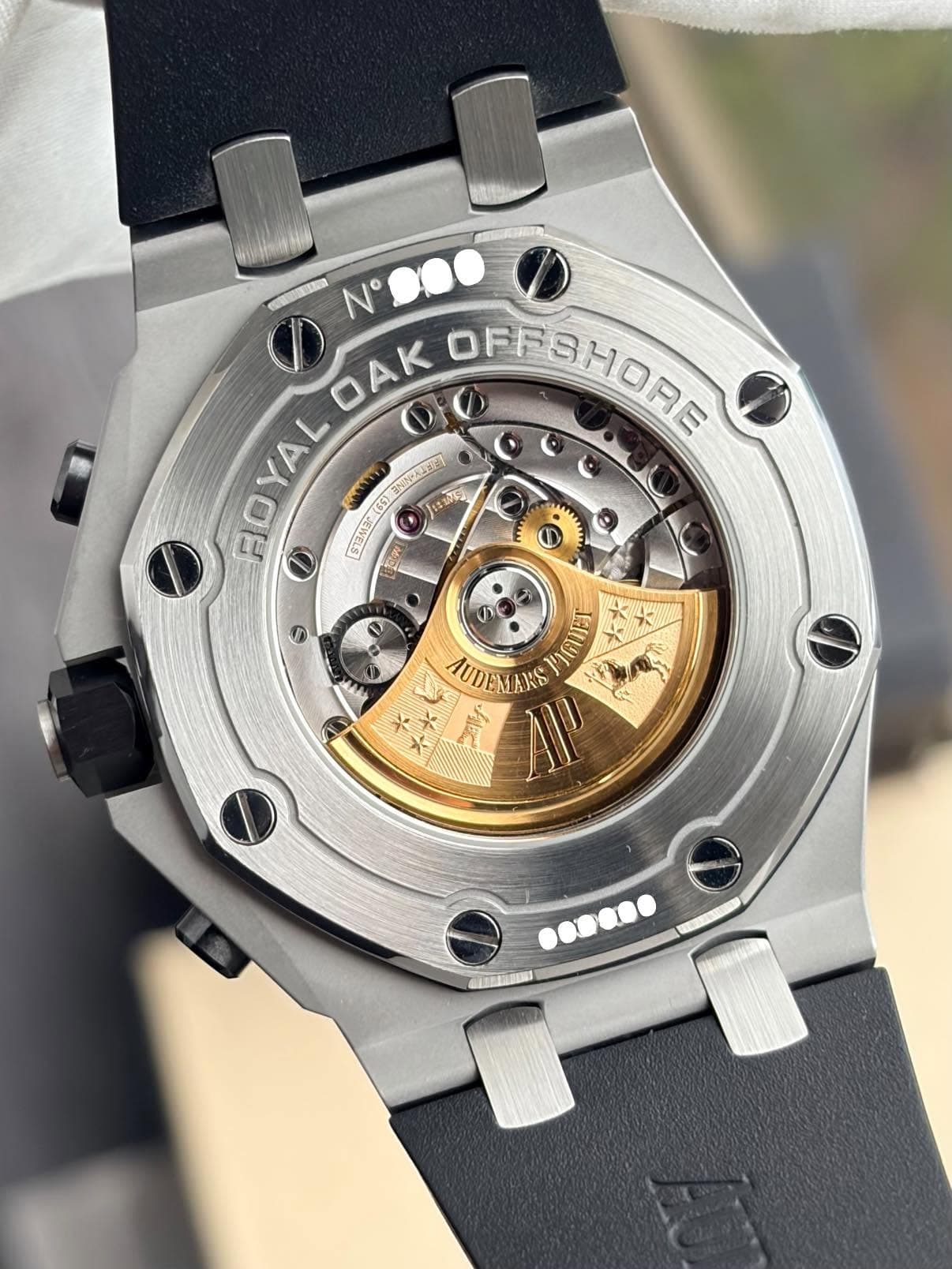 May be an image of wrist watch and text