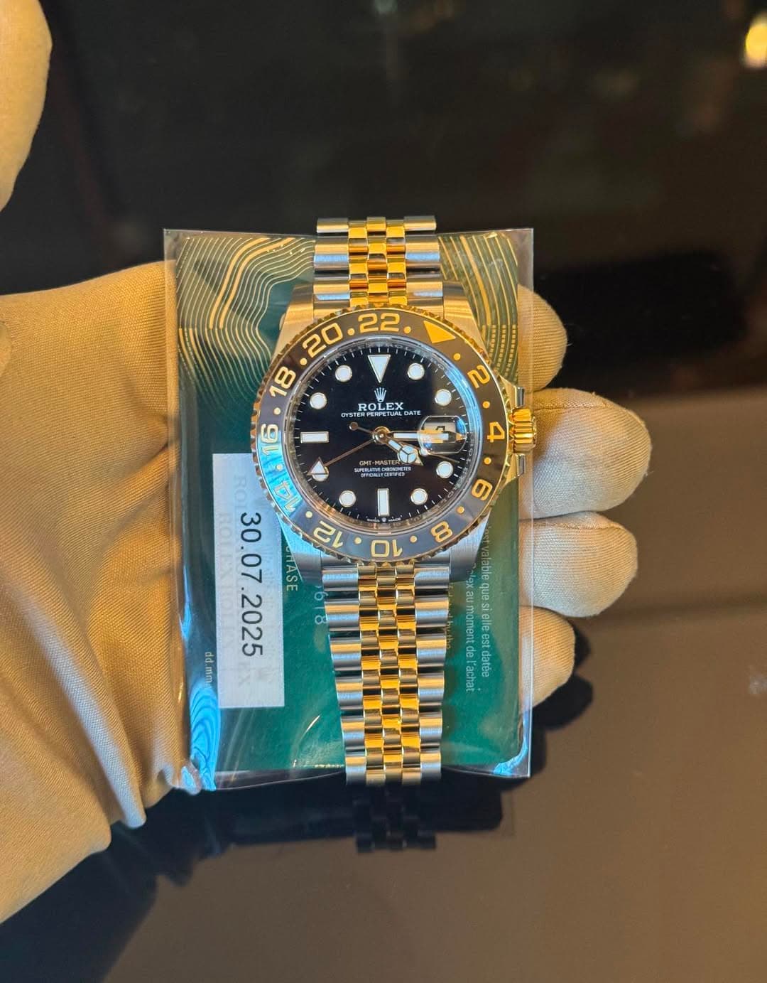 May be an image of wrist watch and text that says ' ROLEX ΕΣ UALDAT DATH ROL 2 6 4 EPO GTASE 12 2025 ៤៤.៣ alaalecue moment yeuceR อธญ'