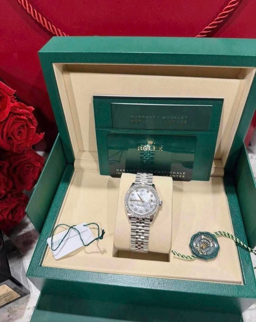 May be an image of wrist watch and text