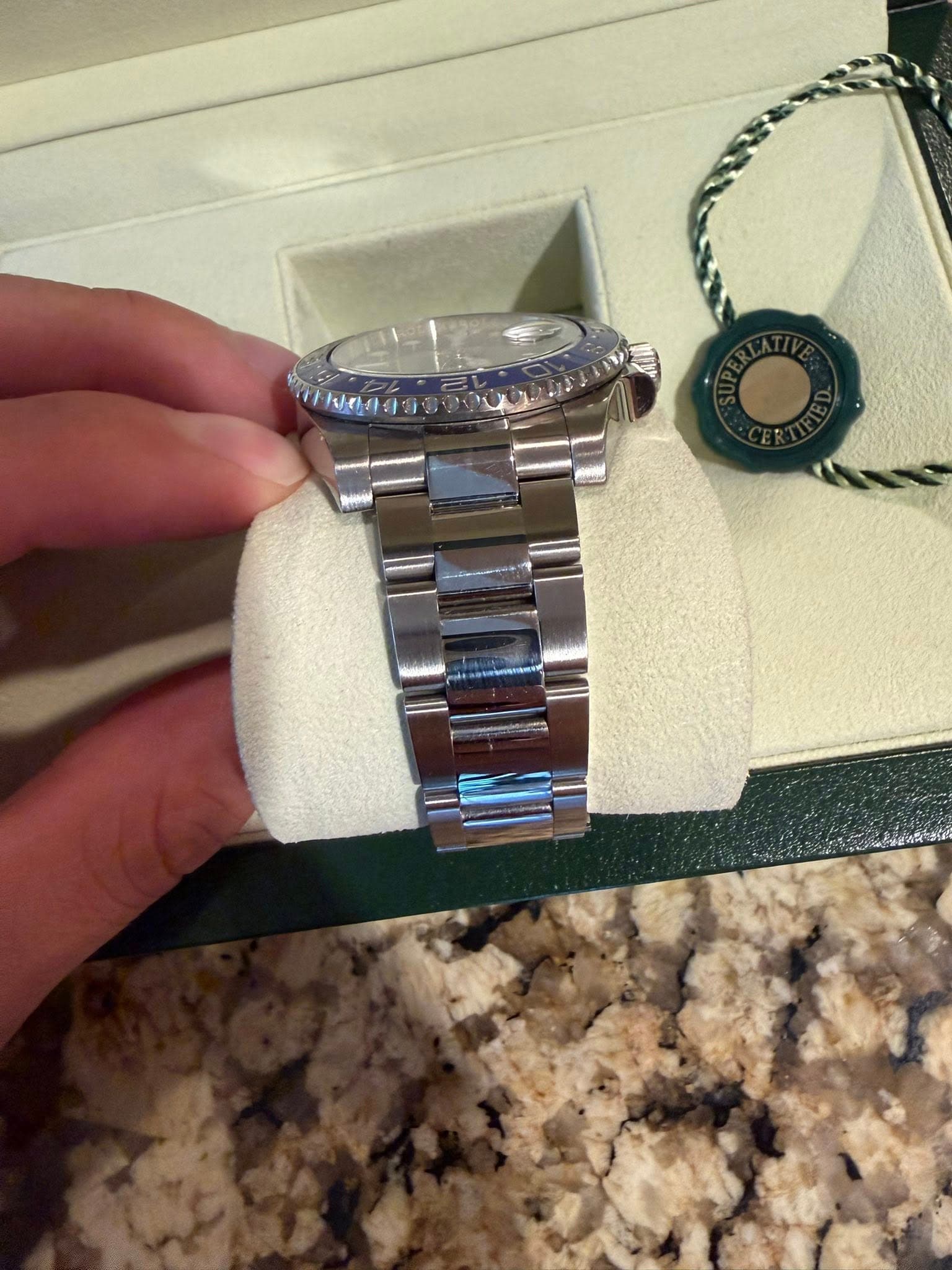 May be an image of wrist watch