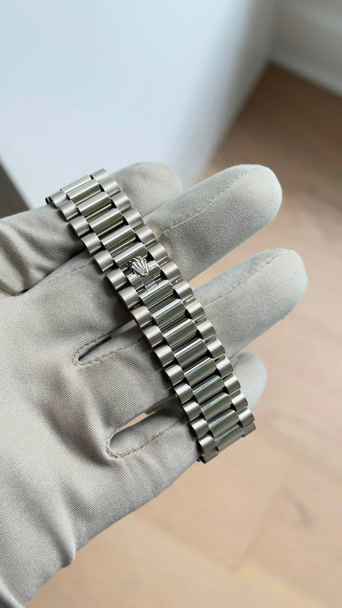 May be an image of wrist watch and jewelry