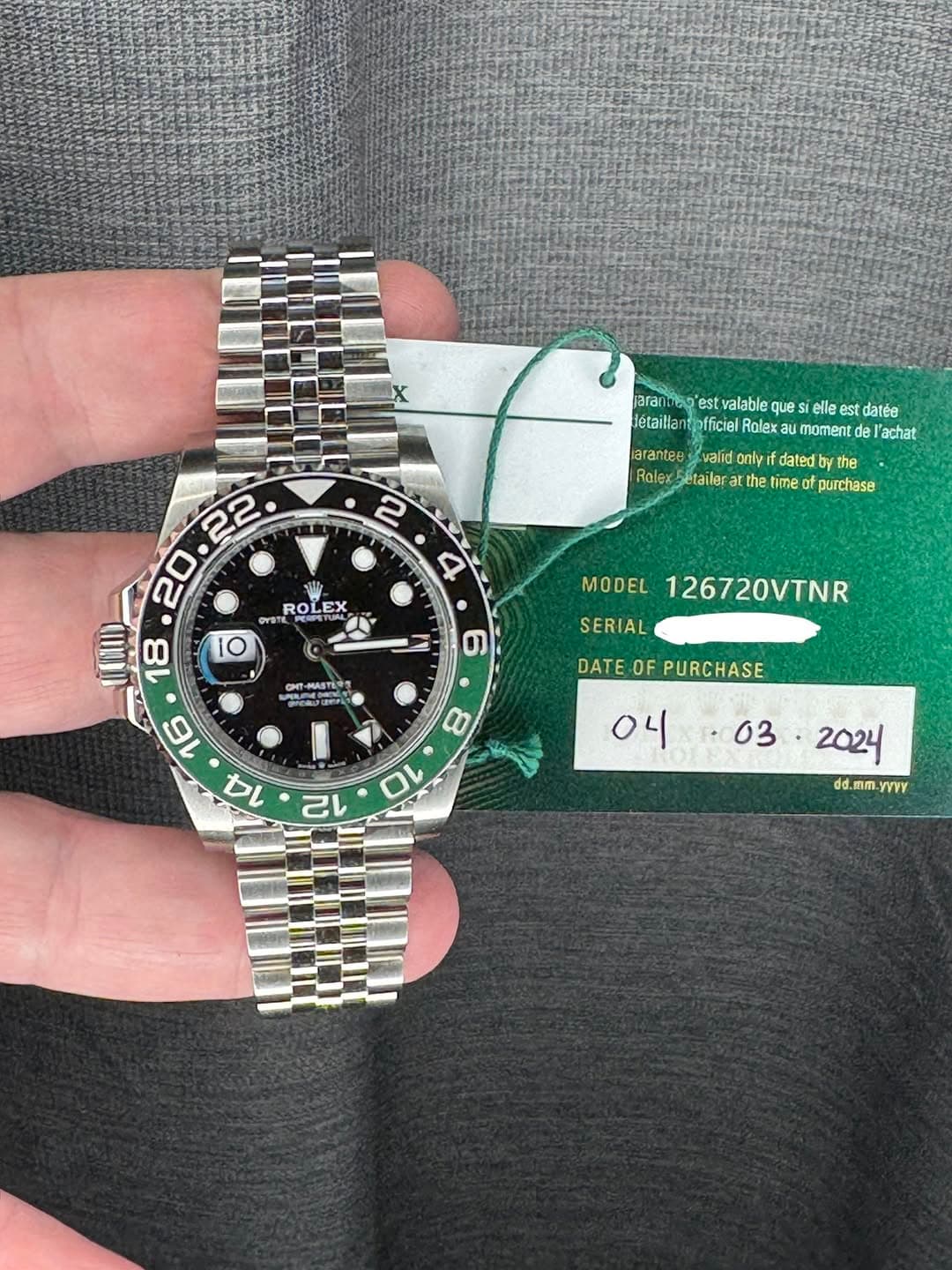 May be an image of wrist watch and text that says 'arans-siestvalablequesiele est valable que elle e datée ara létaillar pfficiel Rolex noment de| achat aranteevalid arantee valid…