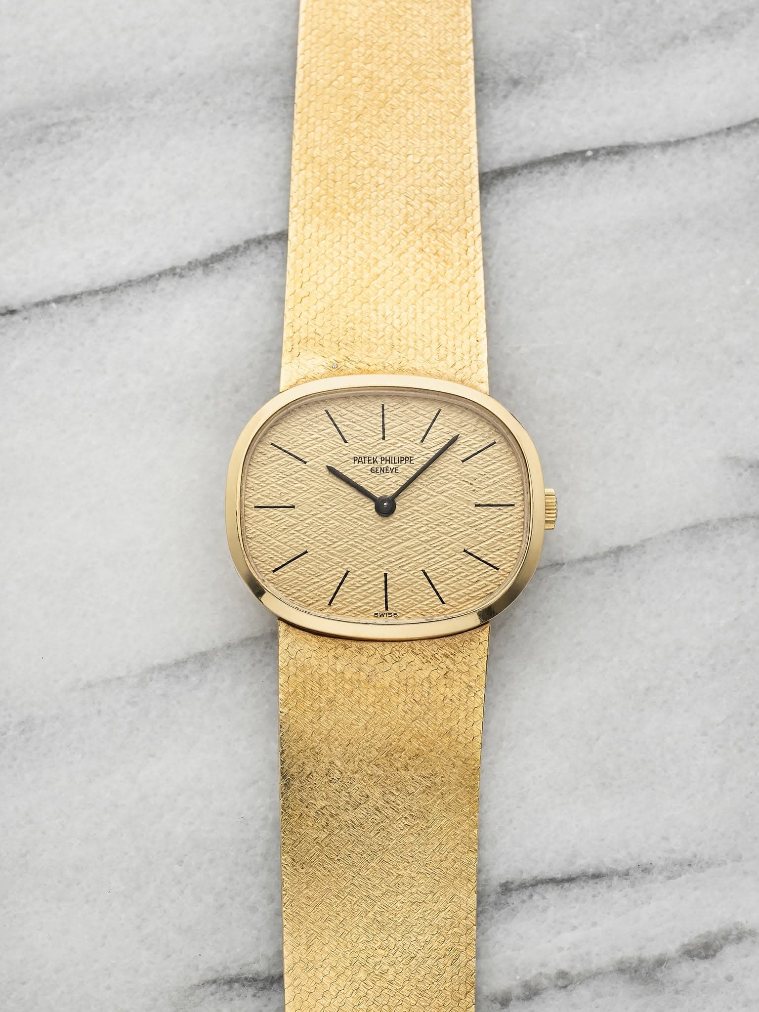 May be an image of wrist watch and leather
