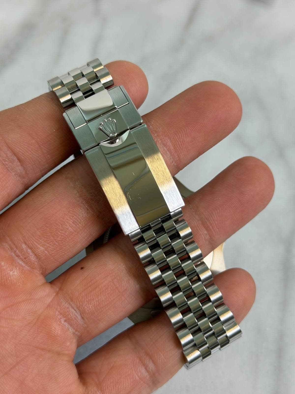 May be an image of wrist watch