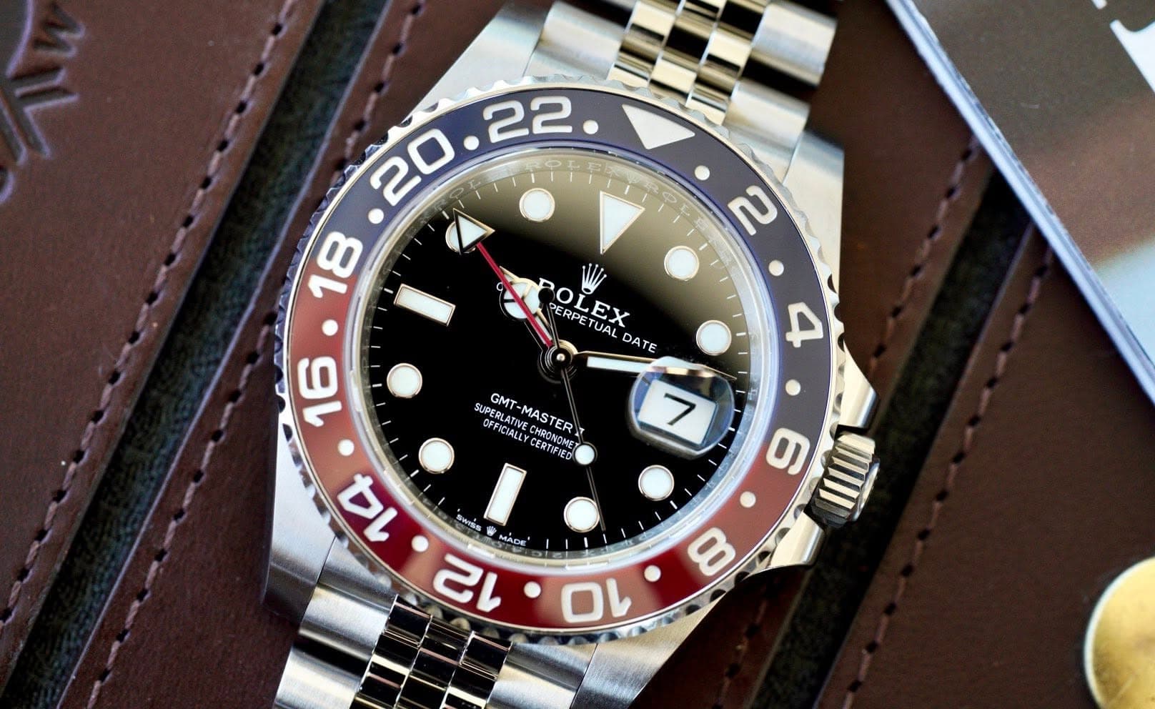 May be an image of wrist watch and text