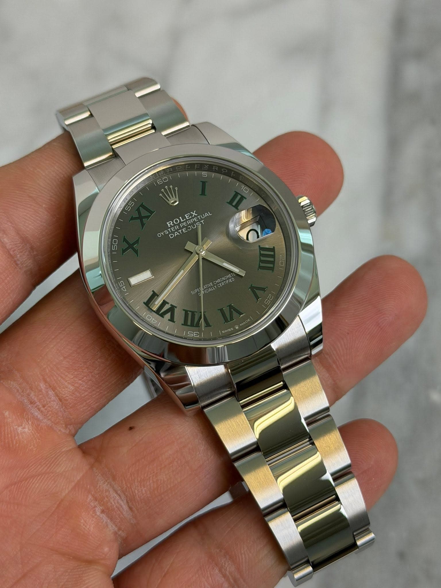 May be an image of wrist watch and text that says 'ROLEX PERPE JUST DA 2A d Sセ Ota SE'