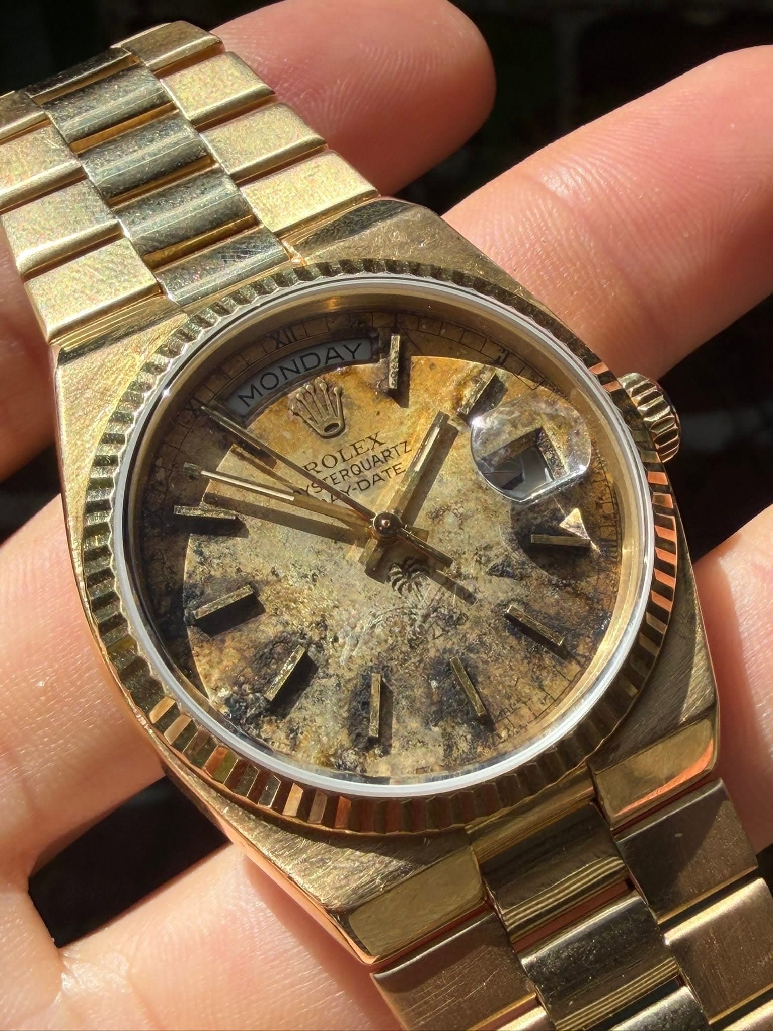 May be an image of wrist watch