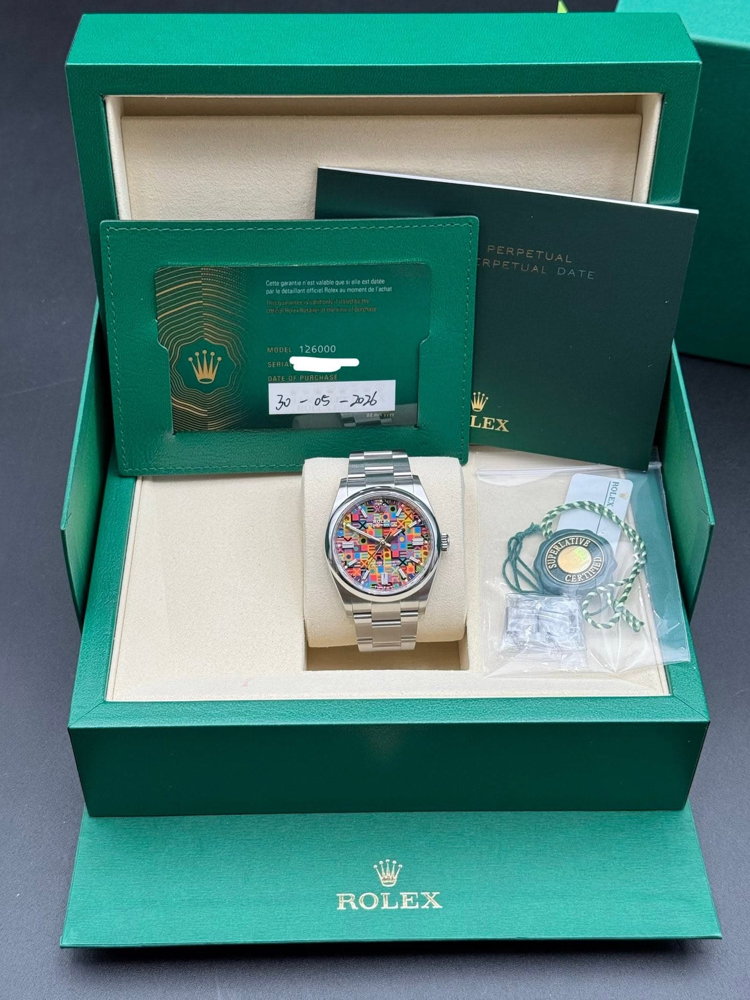 May be an image of digital watch and text that says ' 吃 ערםך- W LEX ROLEX'