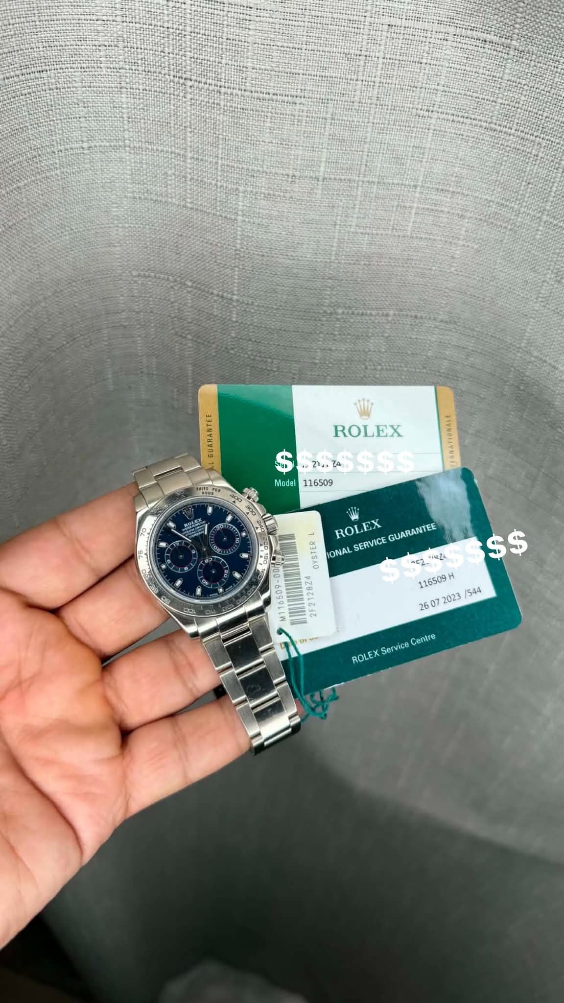 May be an image of wrist watch and text that says 'W ROLEX 1P 21.7A A $$S 116509 Model TIRMOLLYNMT e ខ م FO W ROLEX SERVICE GUARANTEE SOPSAO 吉ん ONAL $ $ -60991 ME2. 42 116509H…