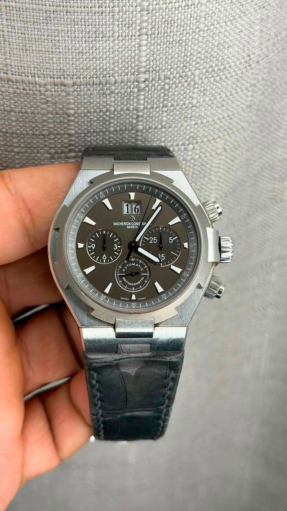 May be an image of wrist watch and text