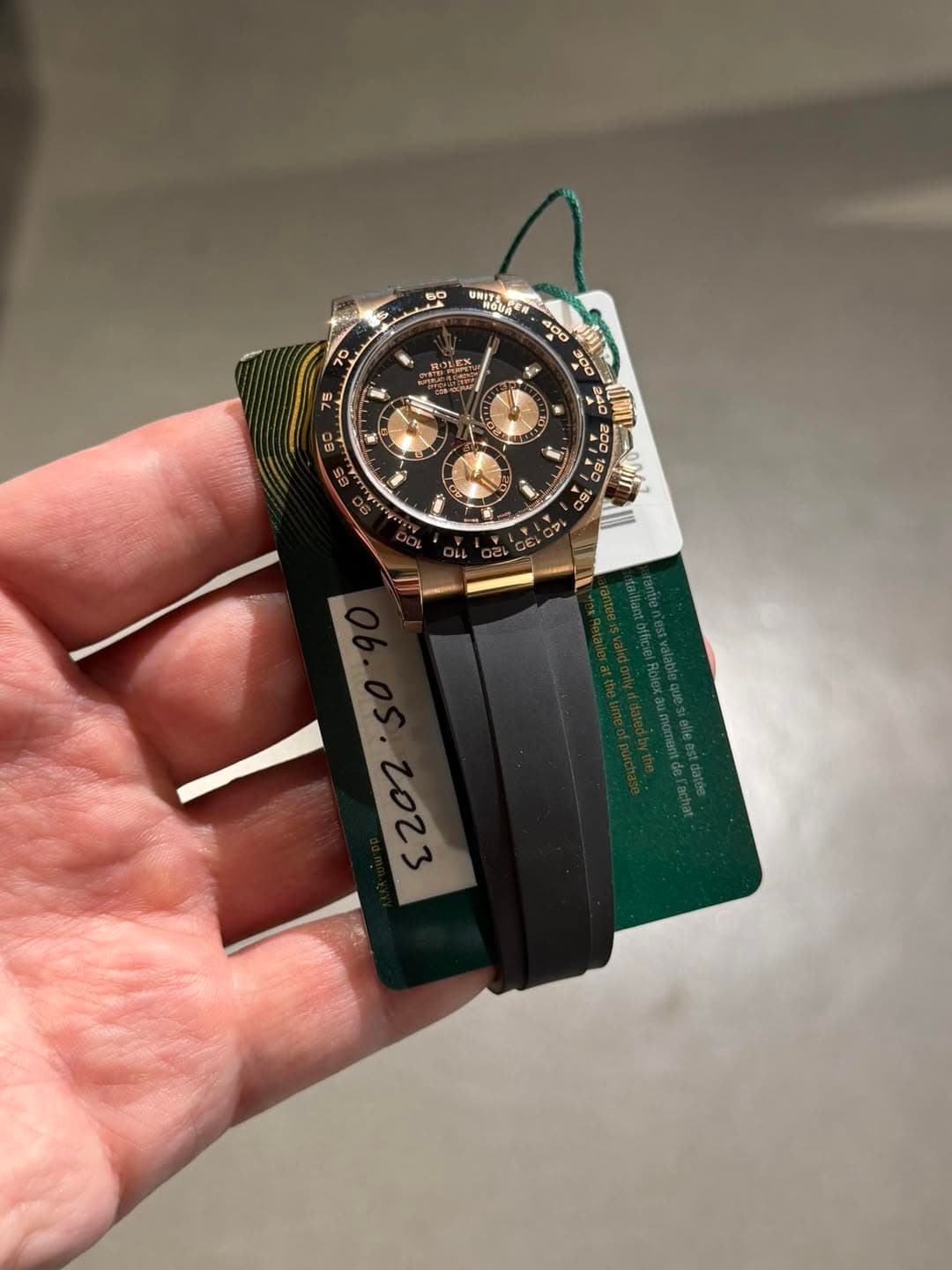 May be an image of wrist watch and text