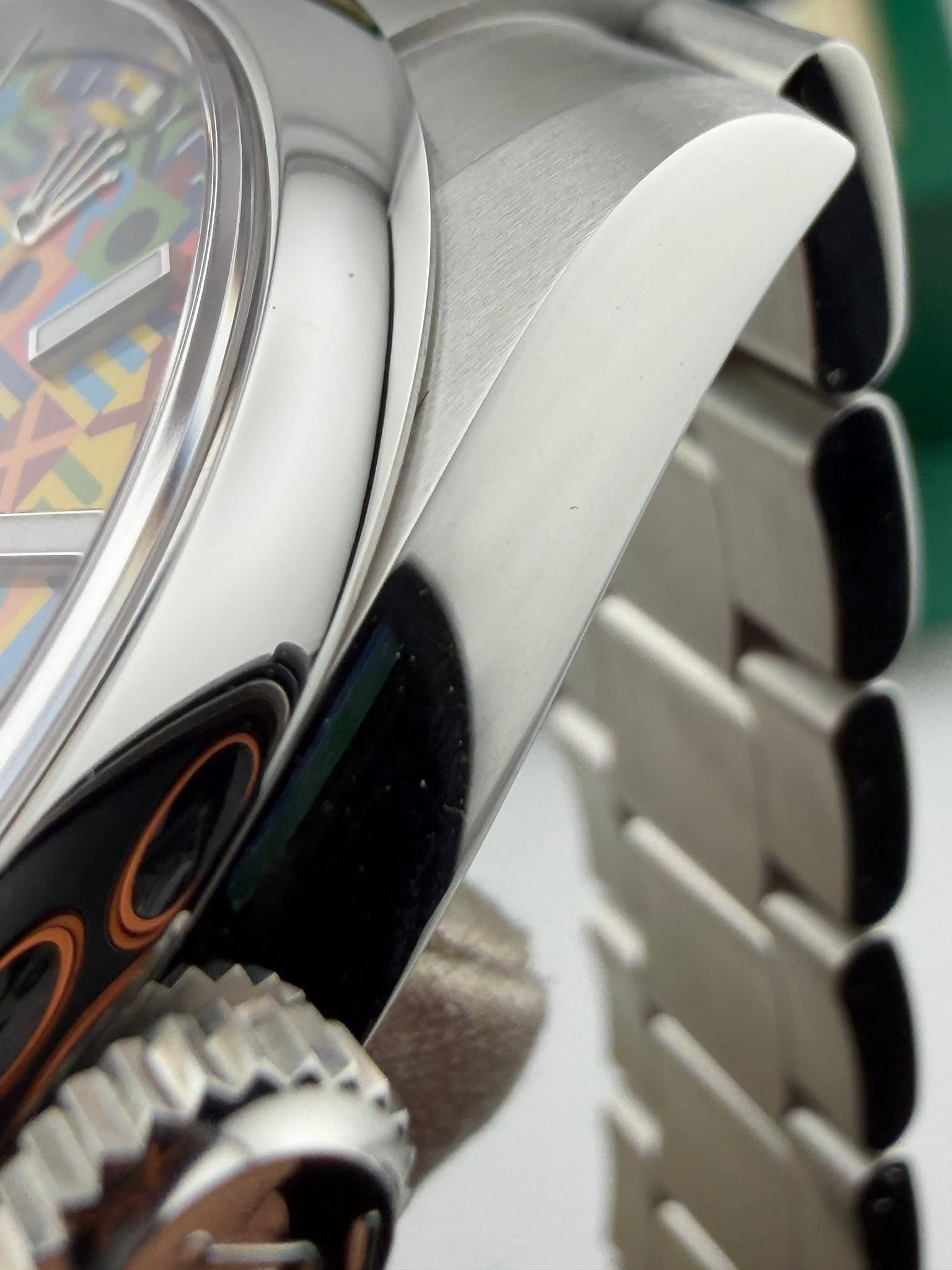 May be an image of wrist watch and text