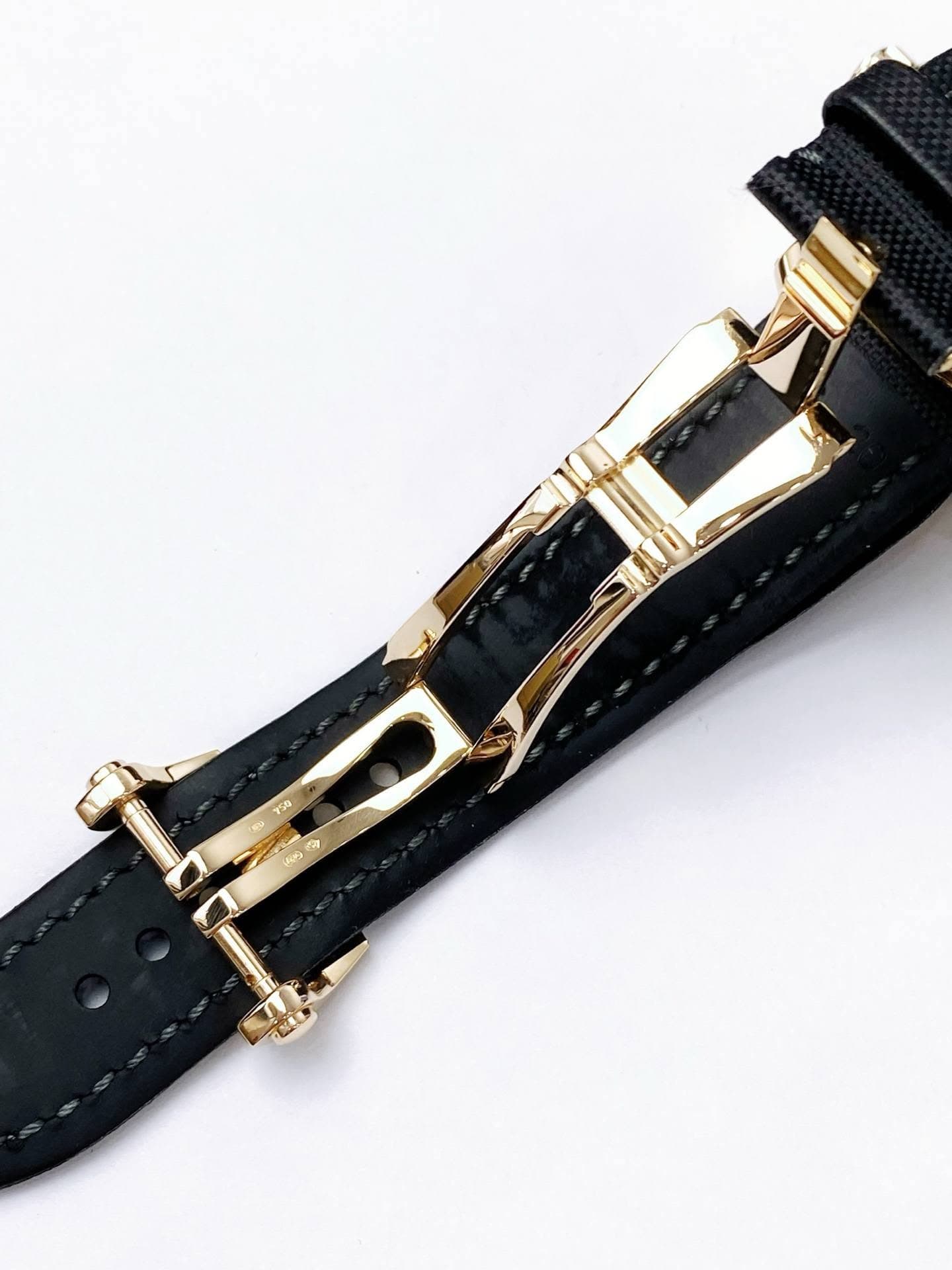 May be an image of wrist watch and leather