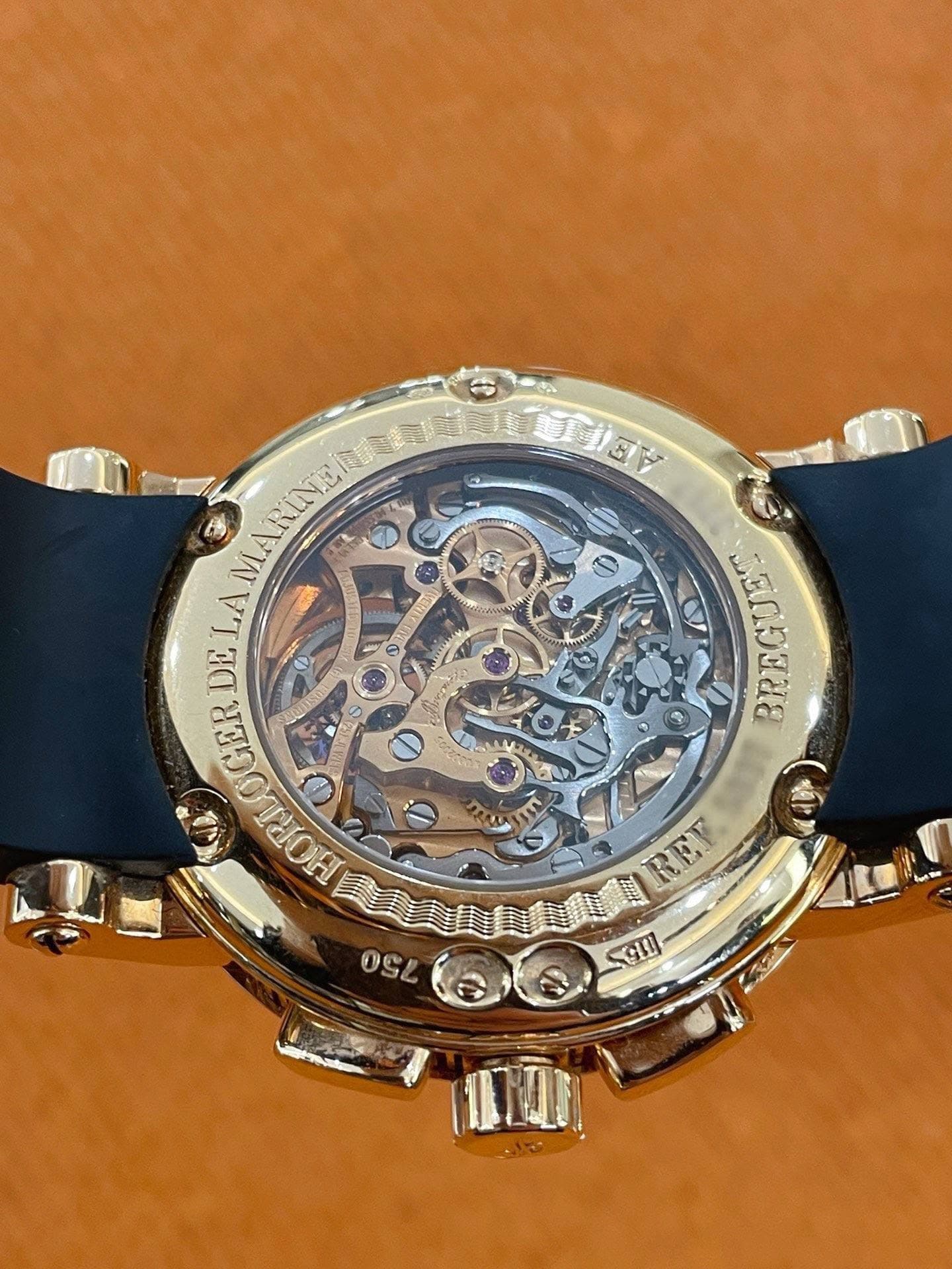 May be an image of wrist watch and text that says '3 MARINE ΜΑΙ W LA DE 0 9 GORLOGER GER O 0 BREGUE! RET ህሮ! 0 w SI'