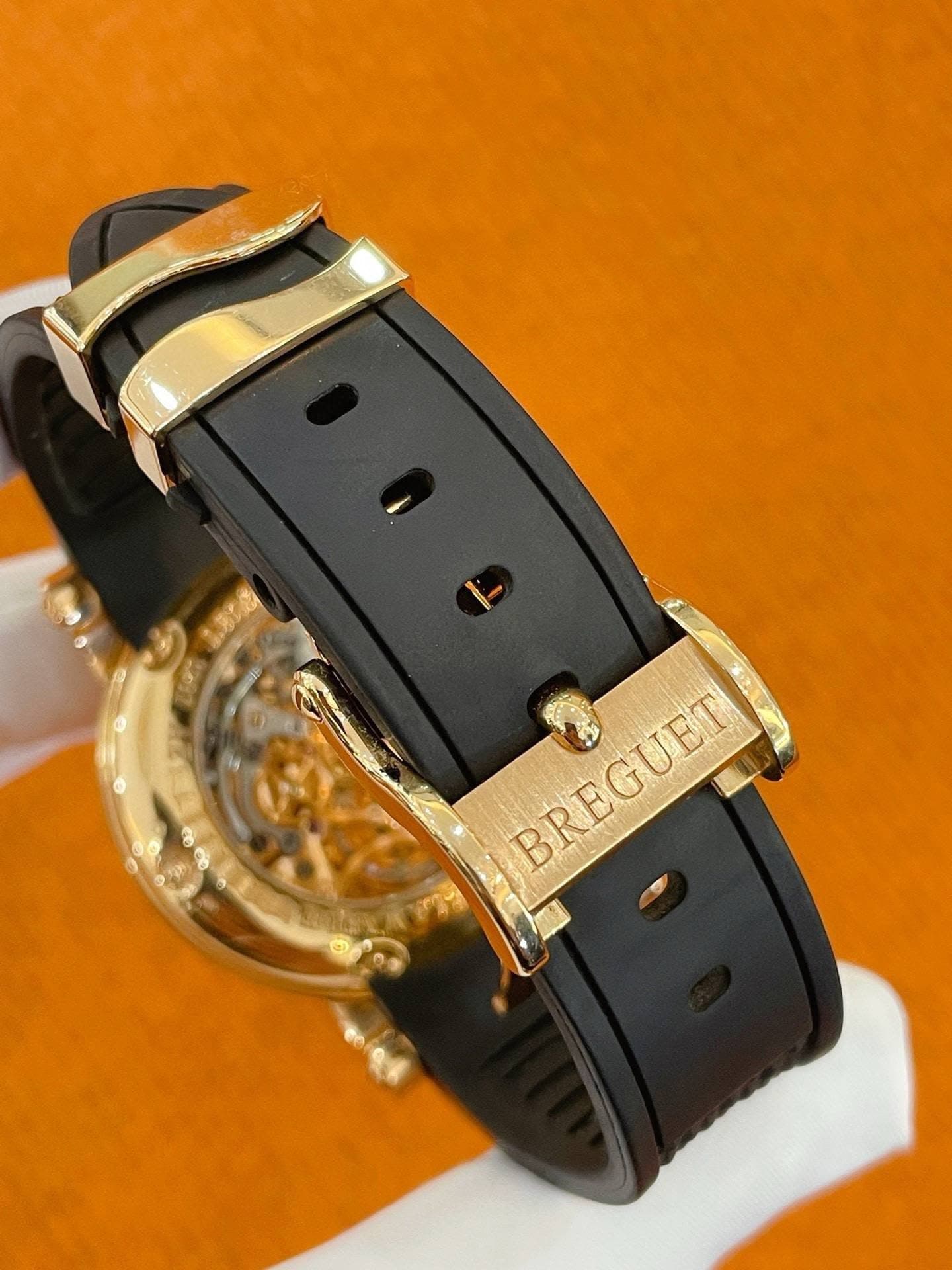 May be an image of wrist watch and text that says 'BREGUET'