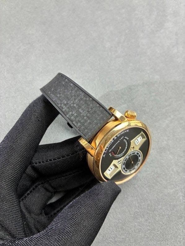 May be an image of wrist watch and text