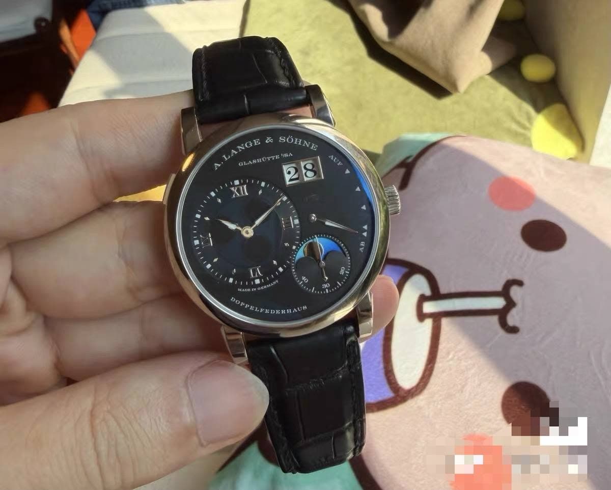 May be an image of digital watch and text