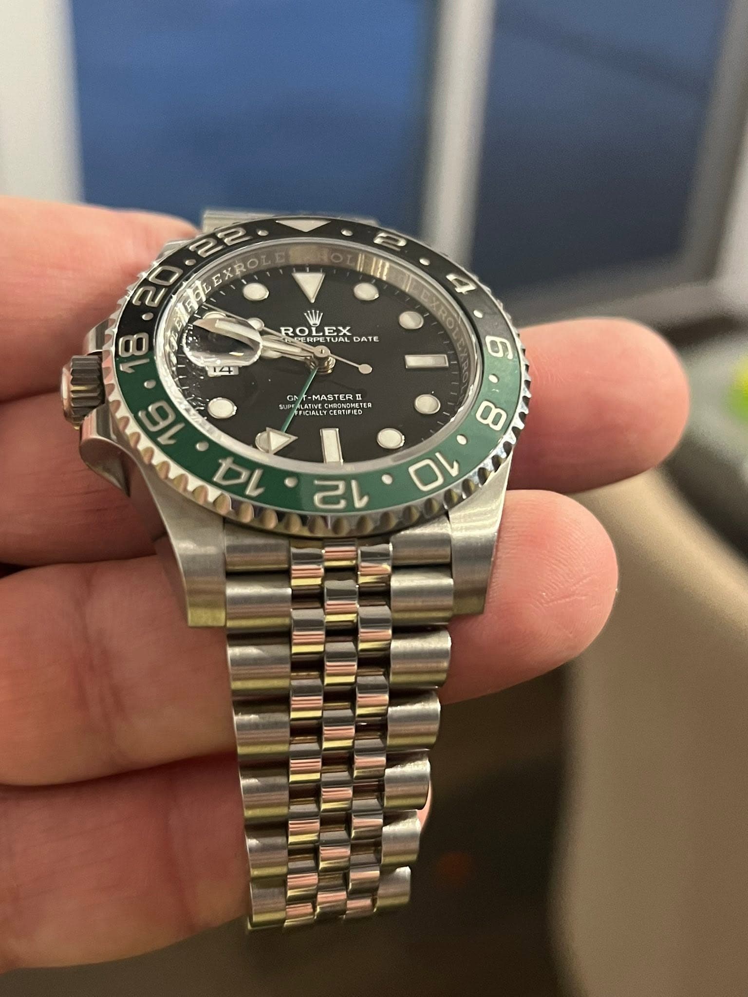 May be an image of wrist watch and text
