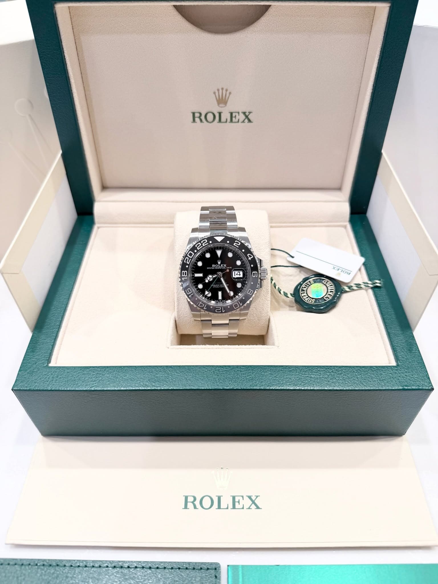 May be an image of wrist watch and text that says 'ROLEX F XTI0M Cns ROLEX'