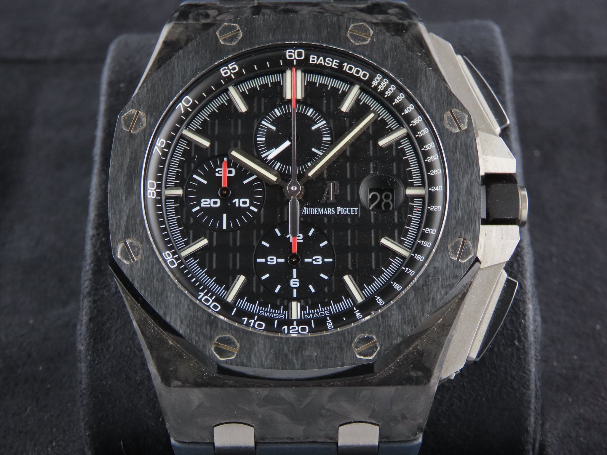 May be an image of wrist watch and text