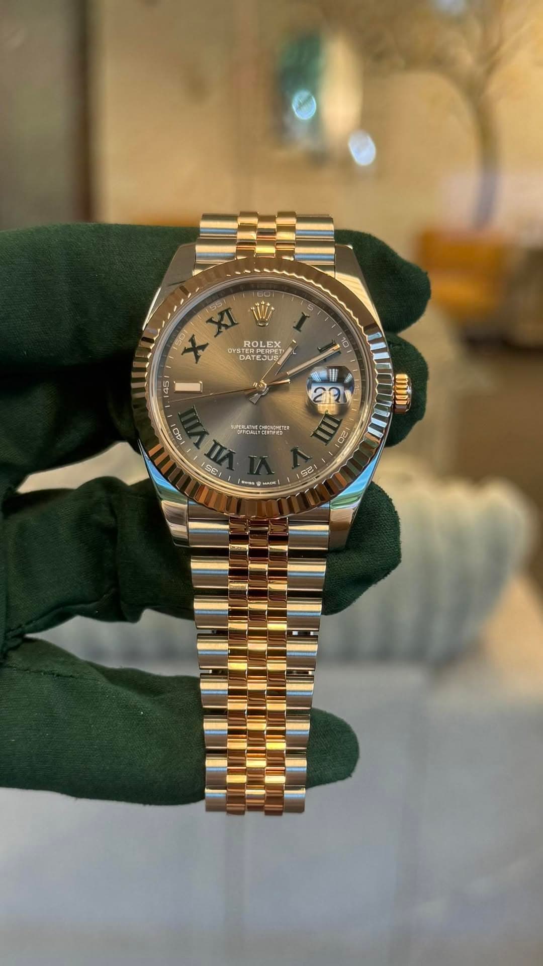 May be an image of wrist watch and text
