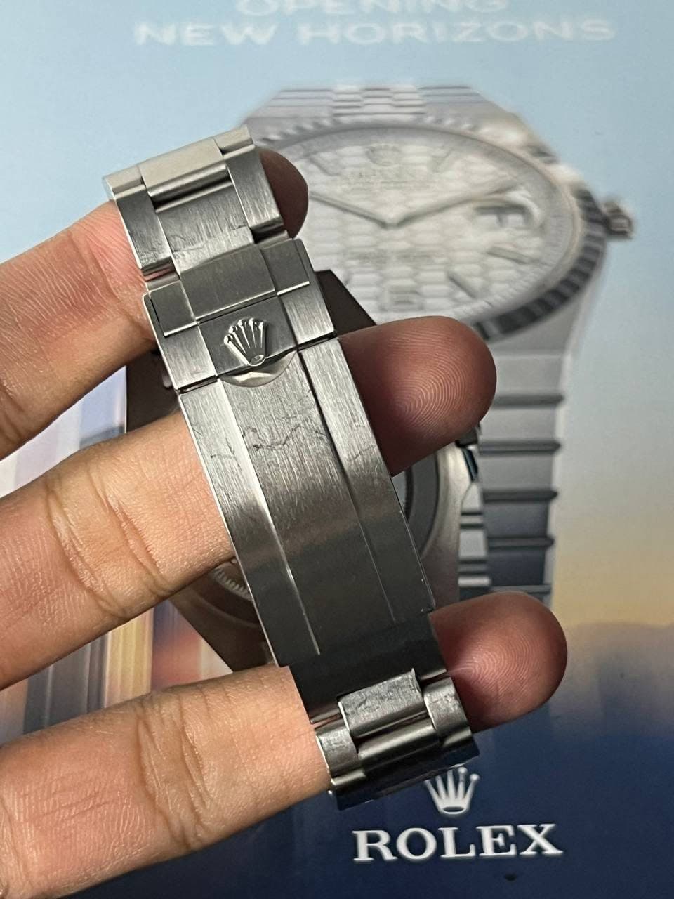 May be an image of wrist watch and text that says 'HORIZONS ROLEX'