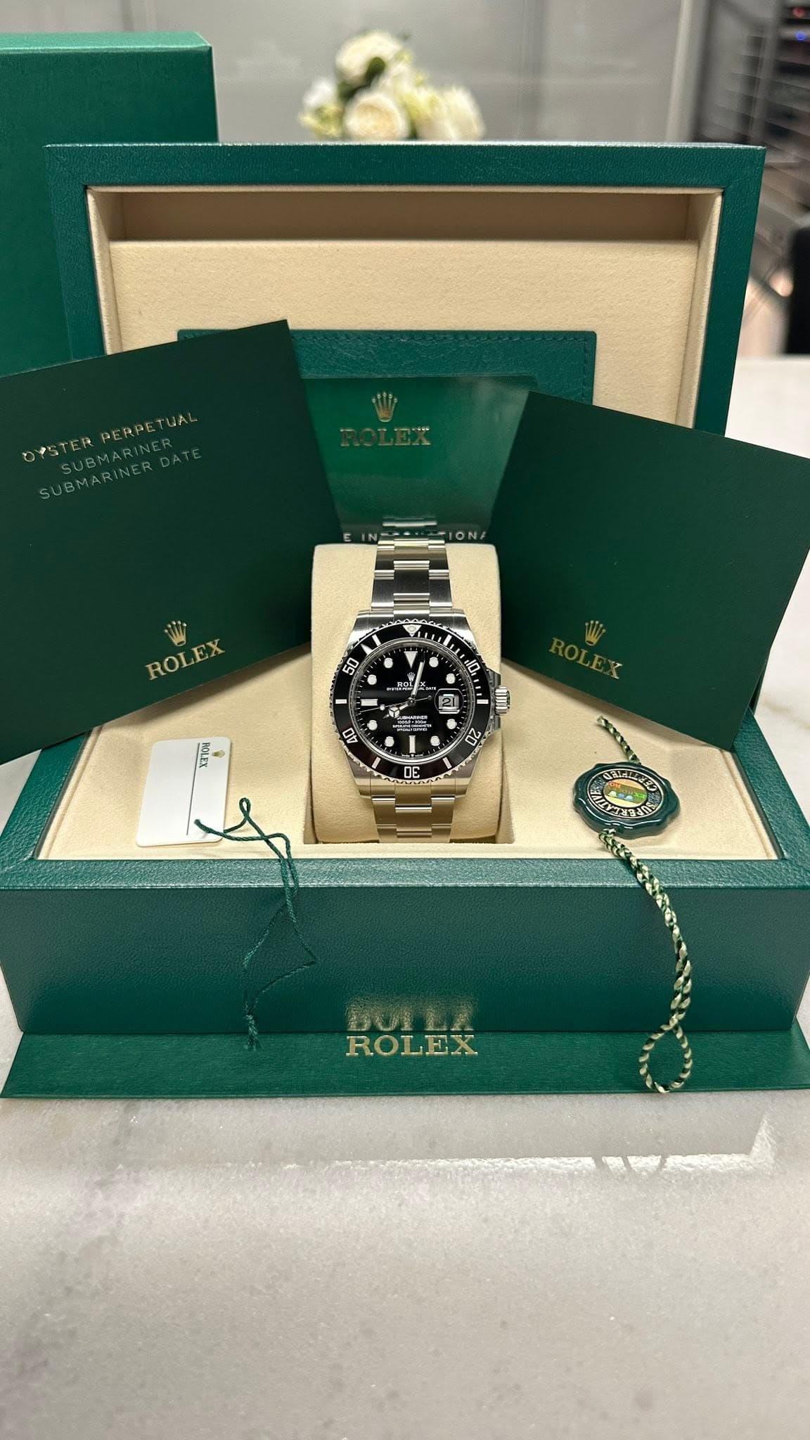 May be an image of wrist watch and text