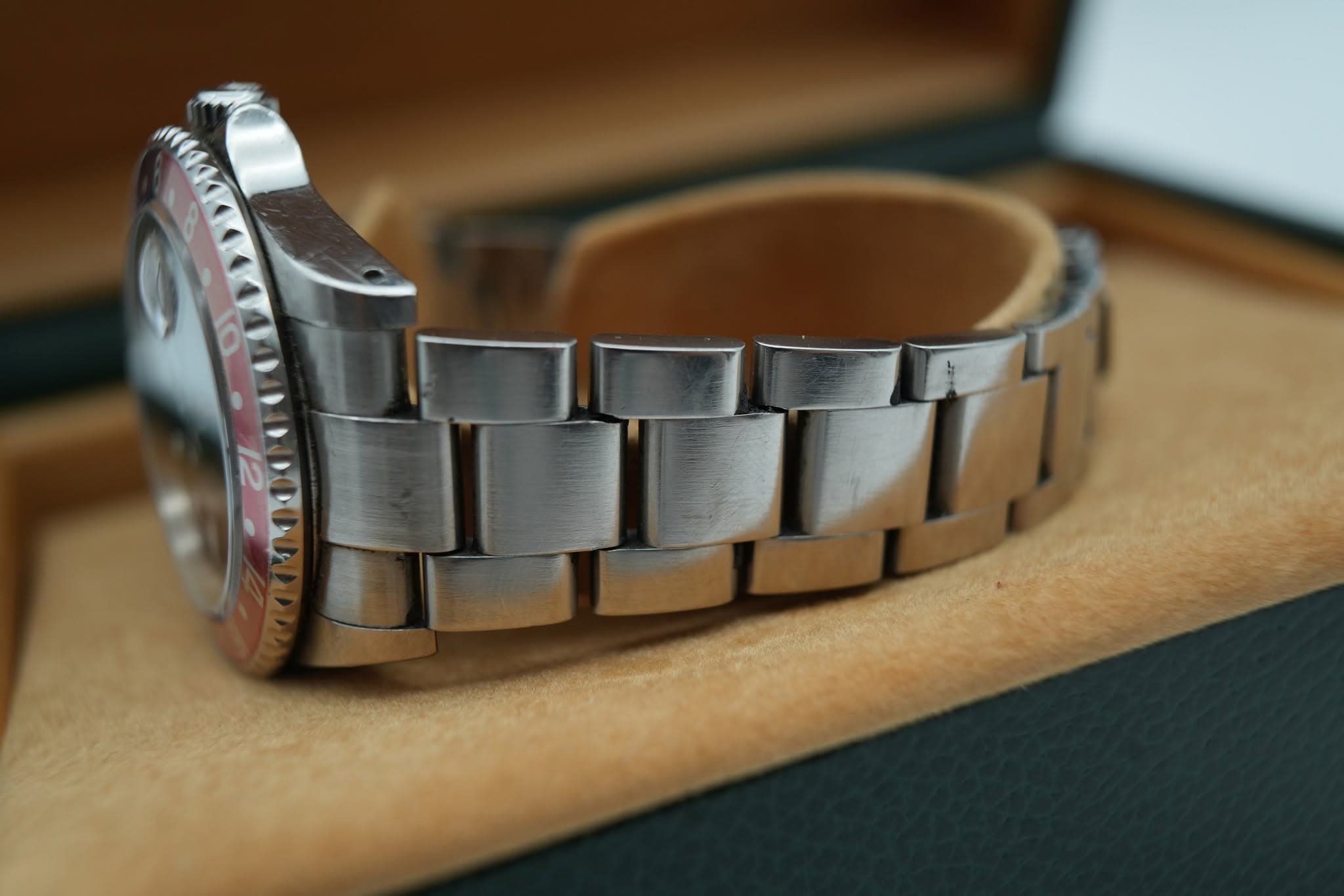 May be an image of wrist watch and text