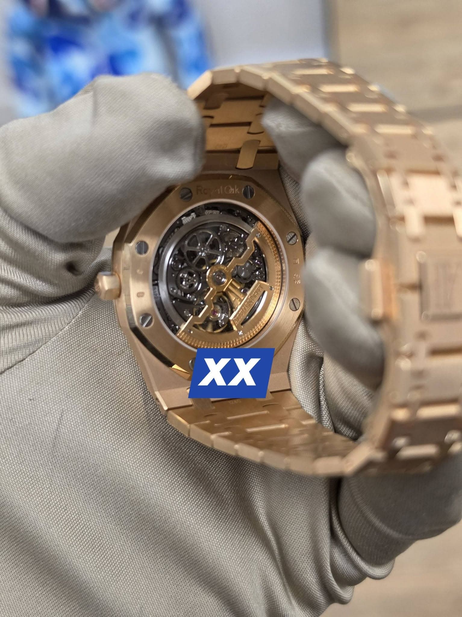 May be an image of wrist watch and text that says 'XX'