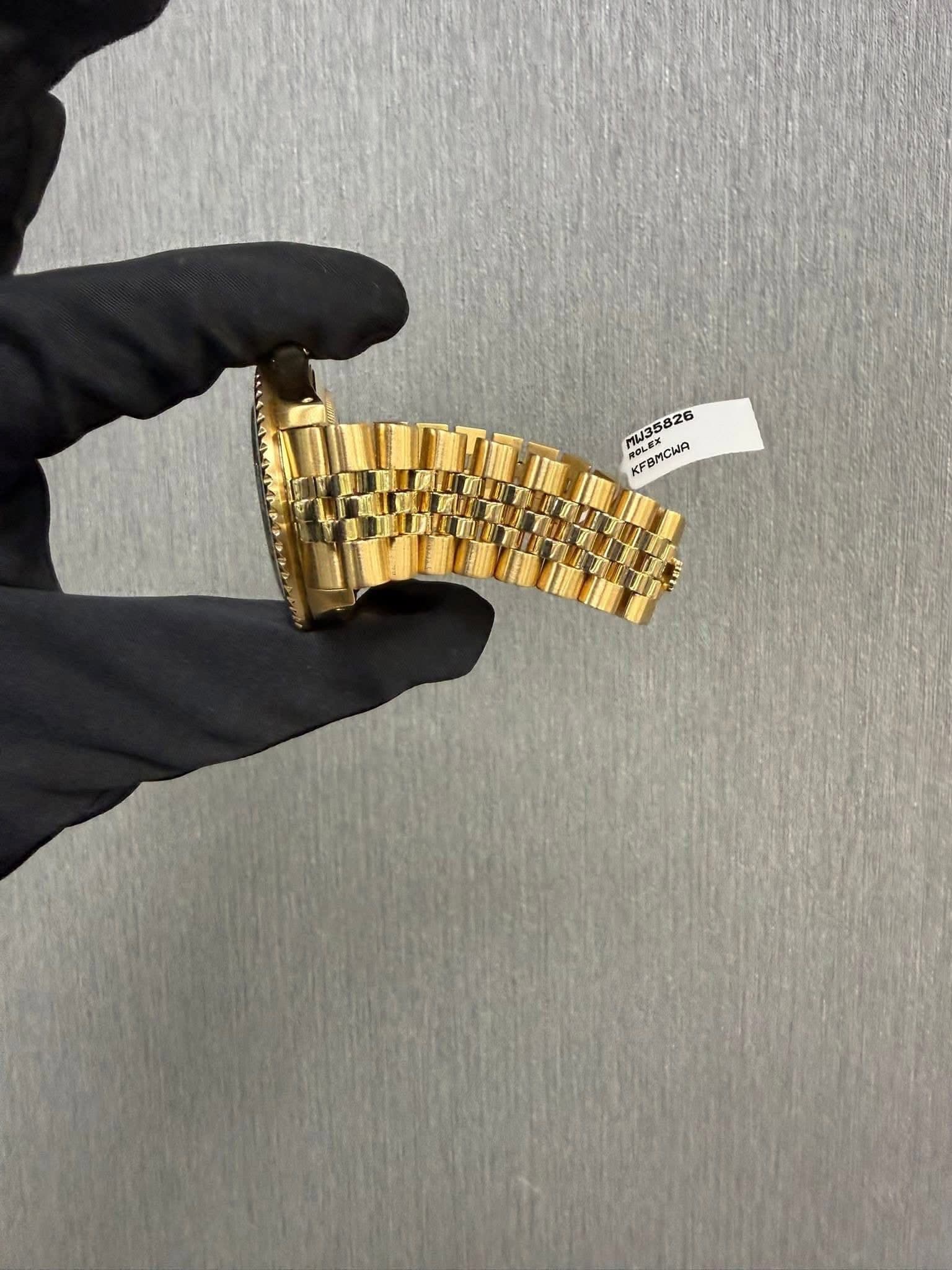 May be an image of wrist watch