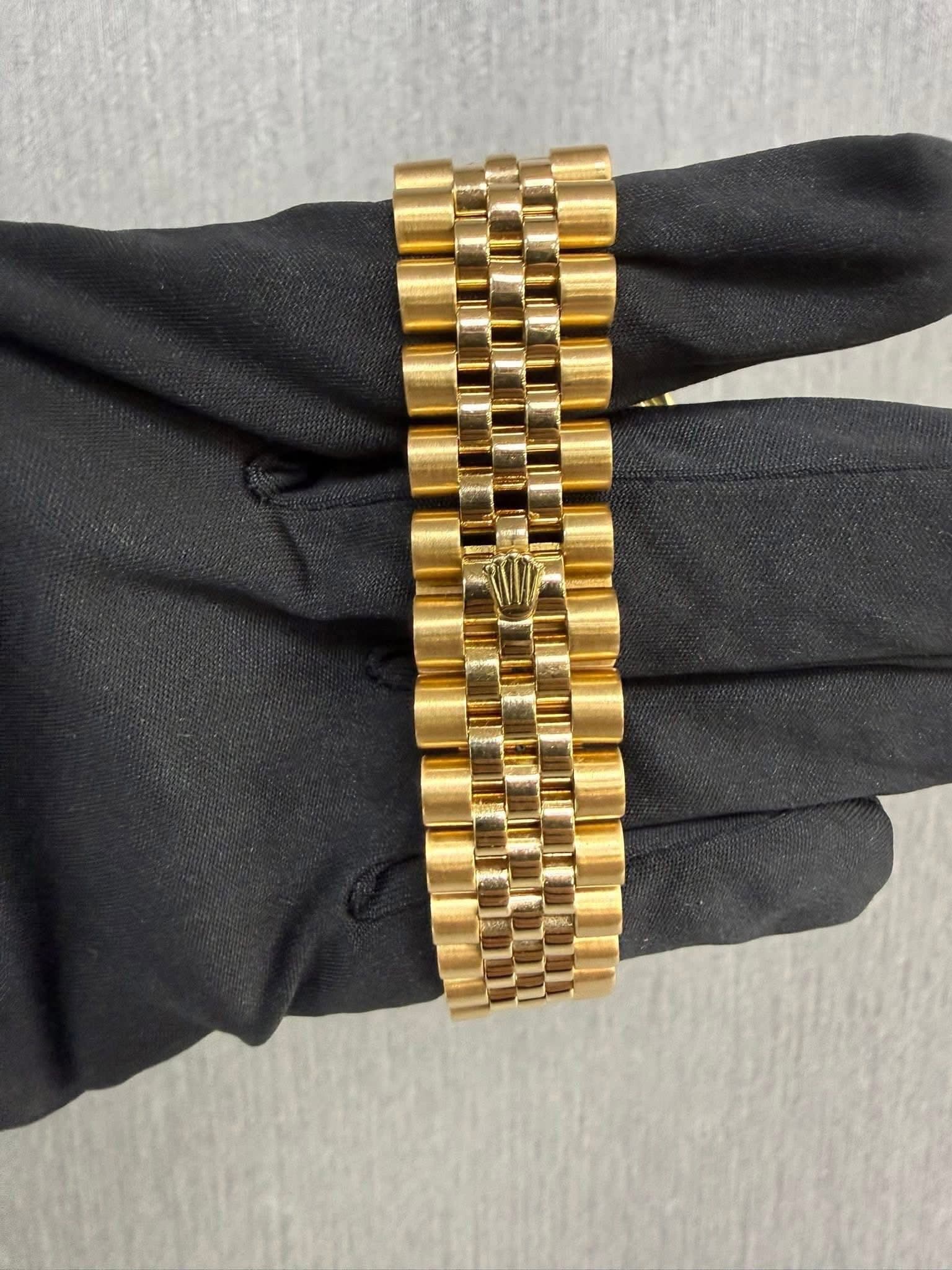 May be an image of wrist watch