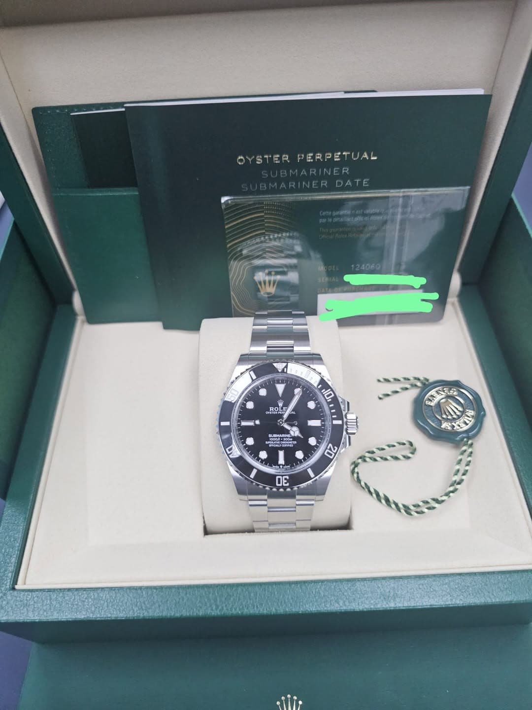May be an image of digital watch and text that says 'OYSTER YSTERPERPETUAL PERPETUAL MARINER MARIN MARINER ARINERDATE DATE kaneletaes.om 黑越 ROL ROLE 10 0 JIND 20 30 C'