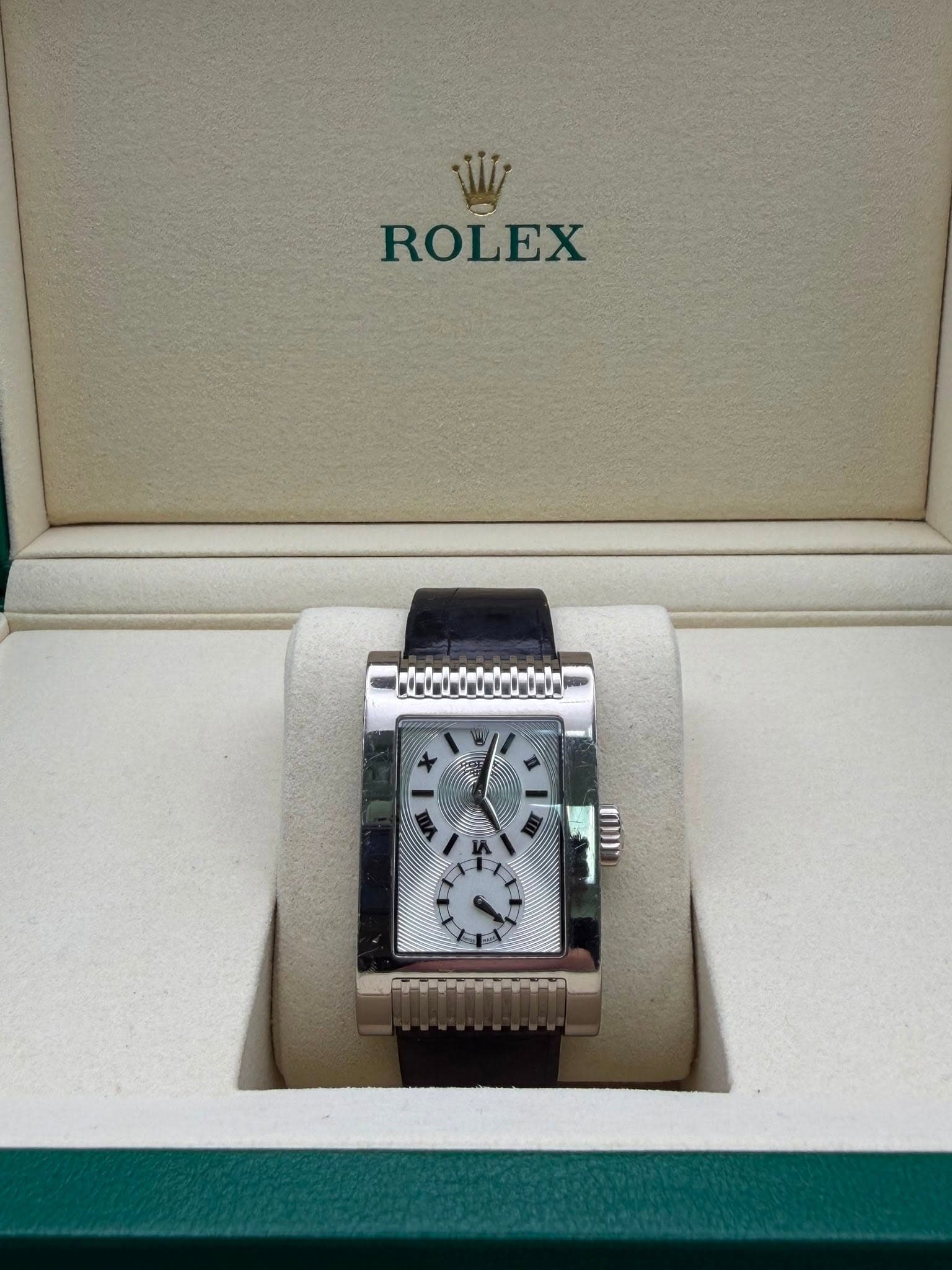 May be an image of wrist watch and text