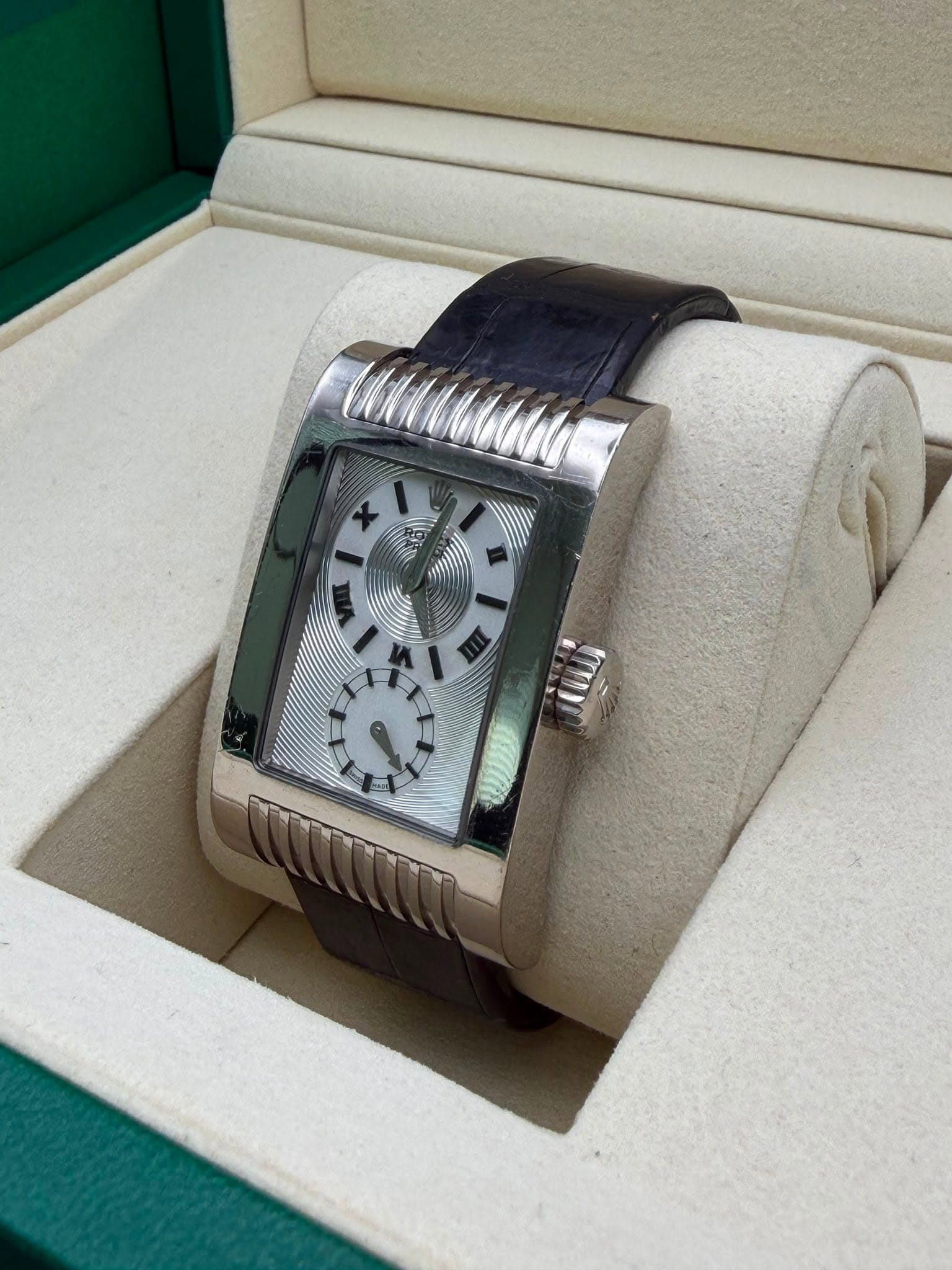 May be an image of wrist watch and text