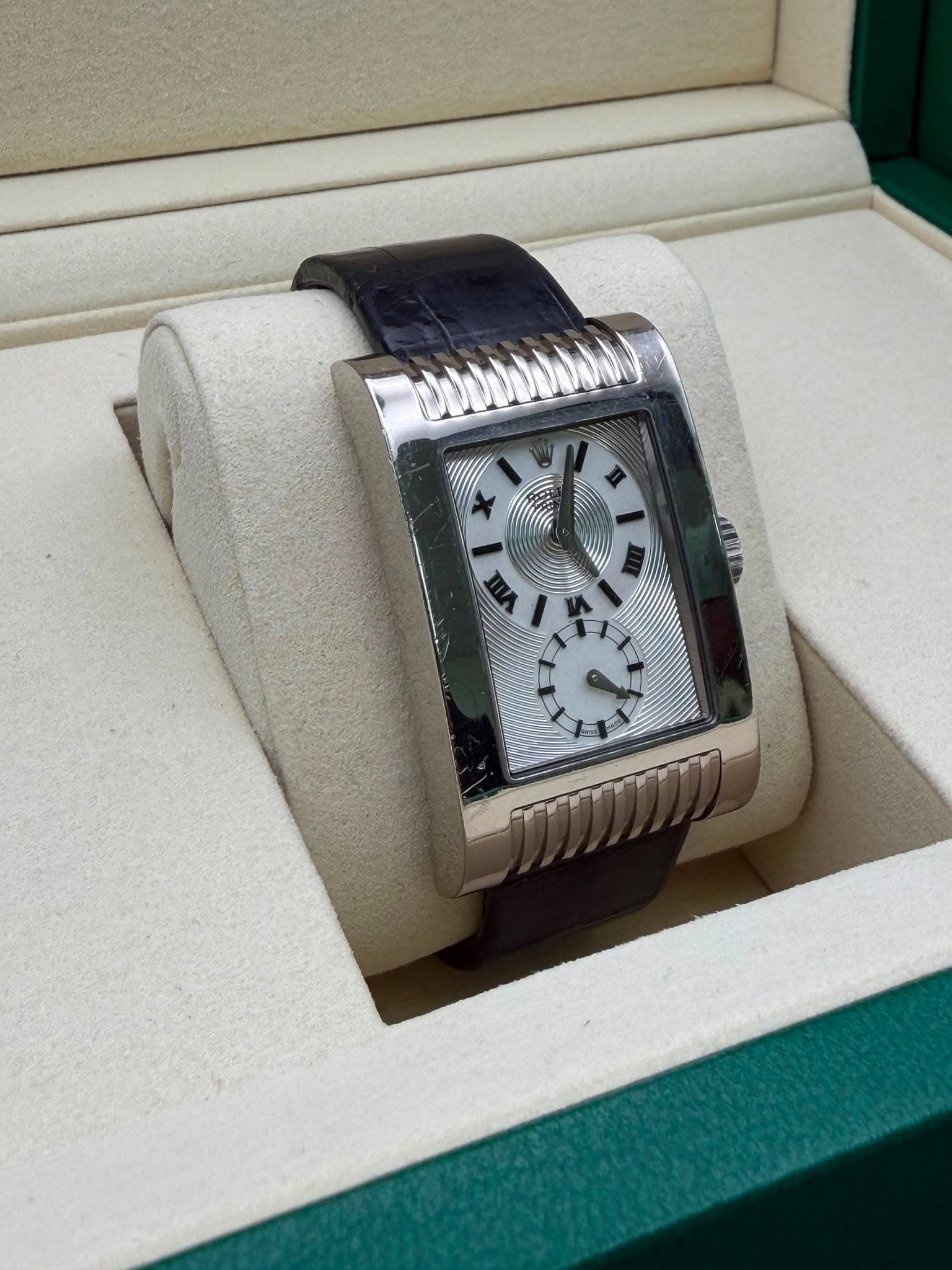 May be an image of wrist watch and text