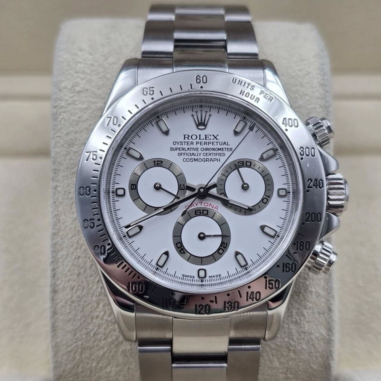 May be an image of wrist watch and text that says '60 65 1 UNITS HOUR PER ROLEX EX SUDERIRTIVE OYSTER PERPETUAL SUPERLATIVE OEPIST OFFICIALLY FFICIALLYCERTFED CHRONGHETE HRONOMETE…